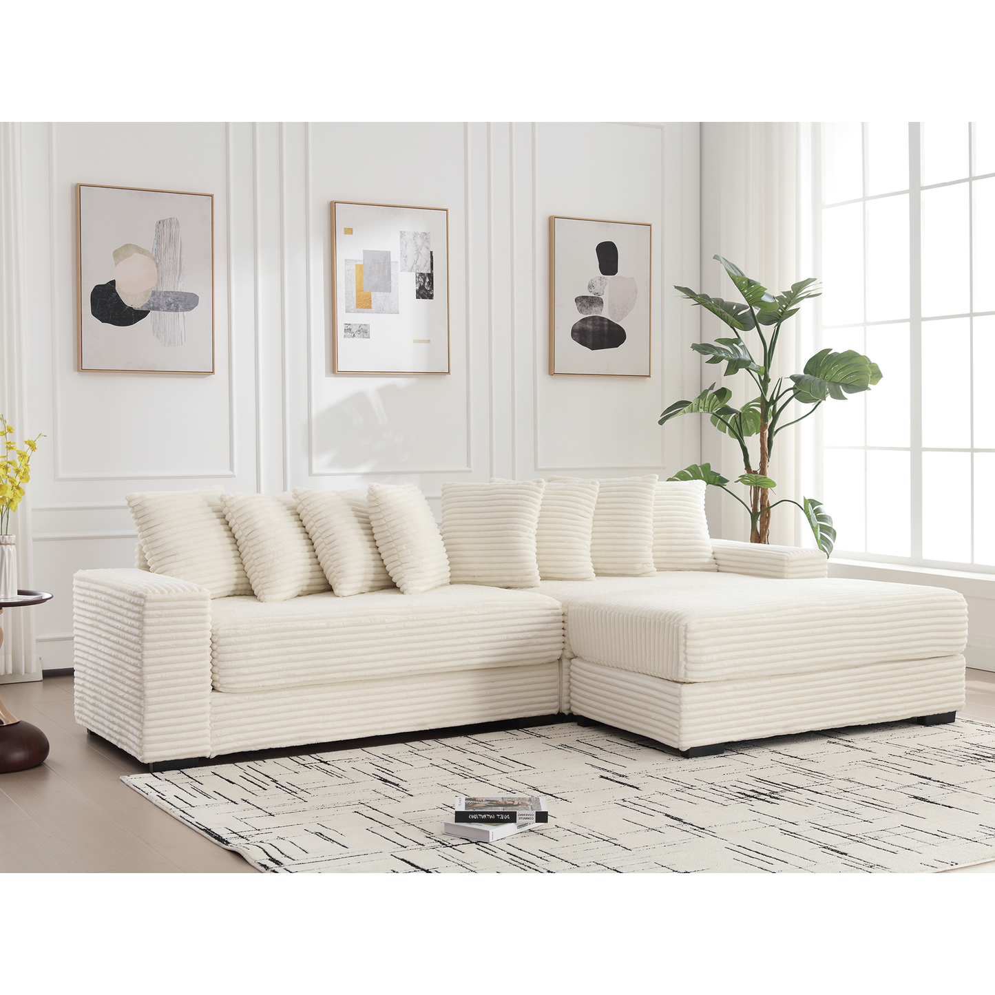 Cream corduroy sectional sofa with plush throw pillows in a modern living room setting