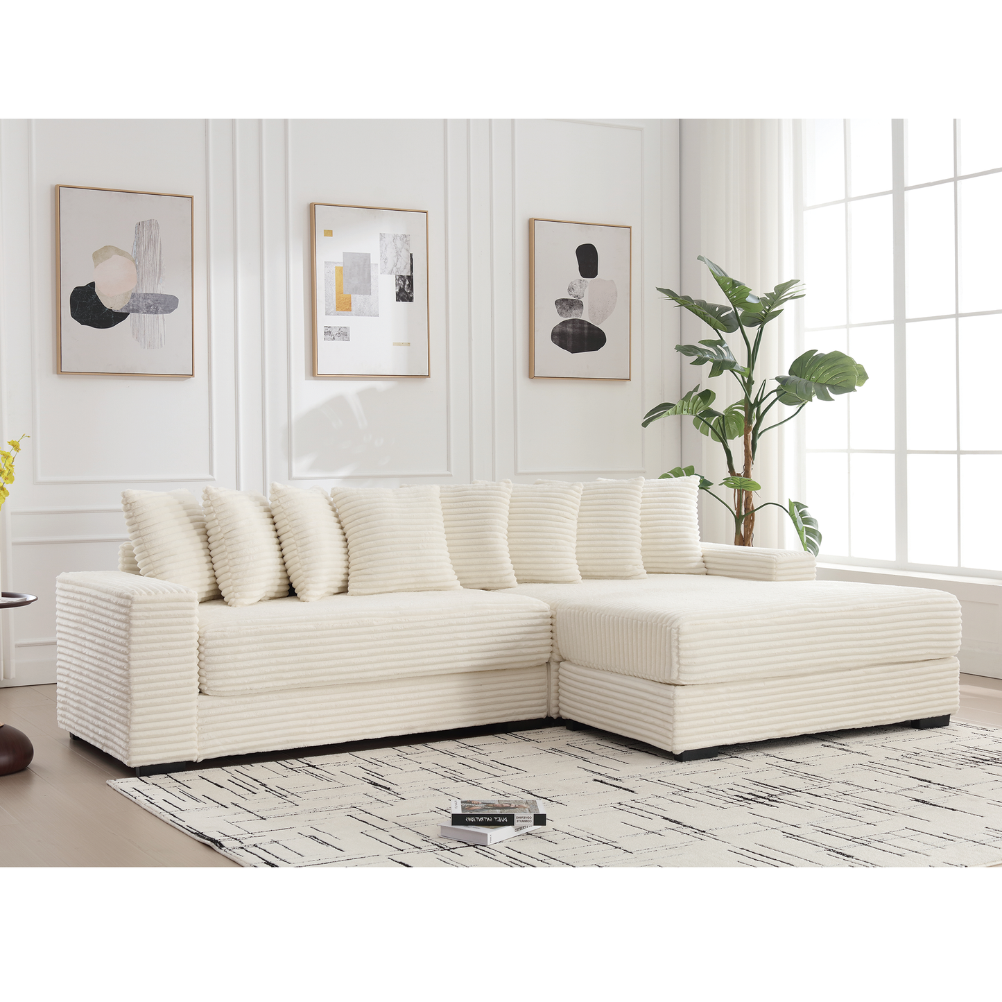 Cream corduroy sectional sofa with plush back cushions and clean lines