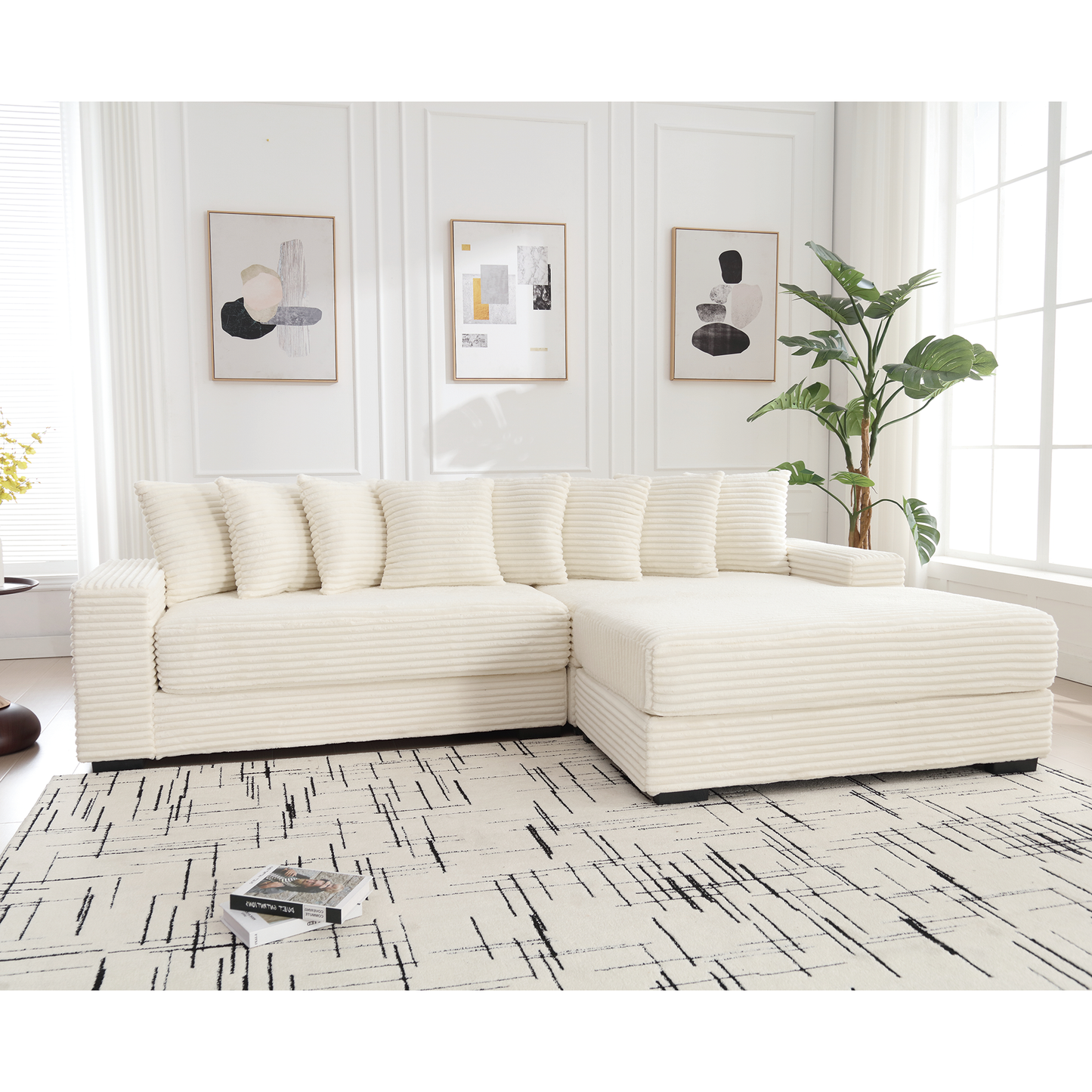 Cream corduroy sectional sofa with plush cushions and ottoman
