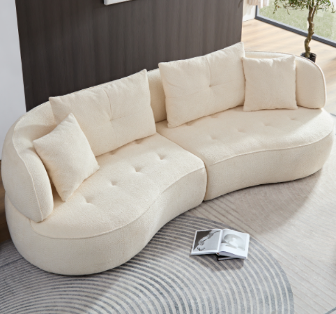Cream boucle modular sofa with curved design and plush cushions for living room seating