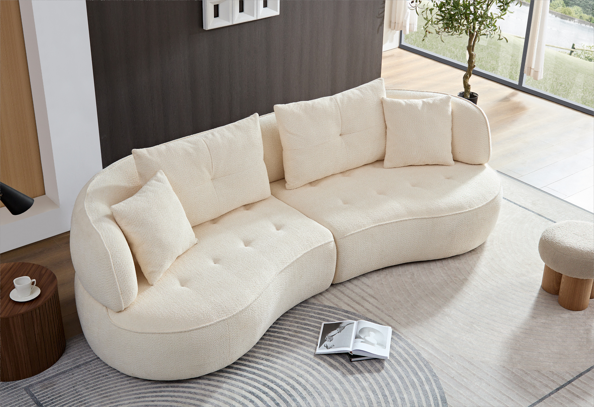 Cream boucle sectional sofa with deep button tufting and plush throw pillows for a cozy living room