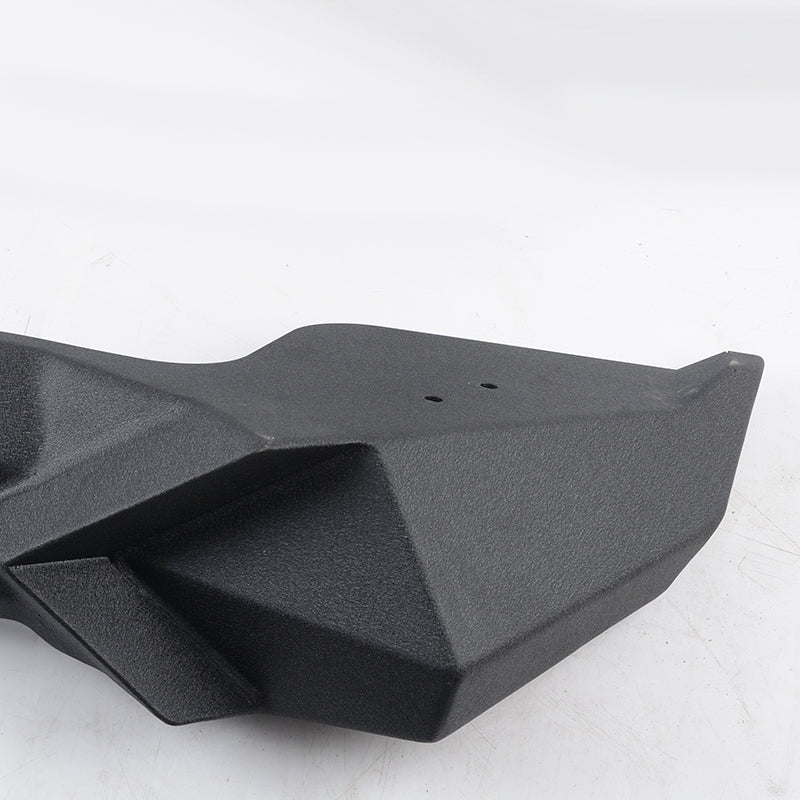 Textured black plastic offroad fender flare with geometric design