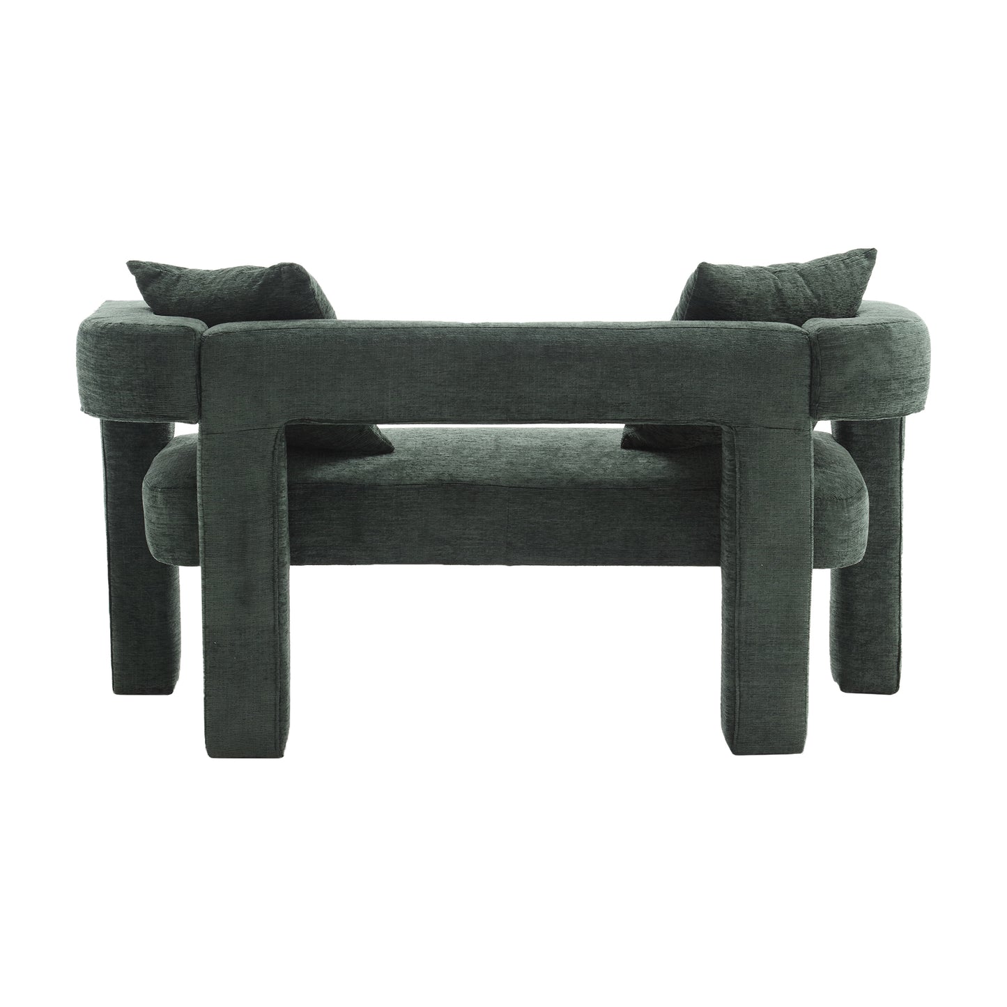 Dark green upholstered armchair with block legs and two throw pillows