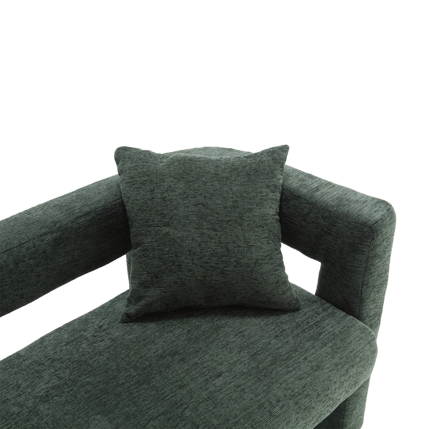 Closeup of a dark green corduroy accent pillow on a matching sofa section
