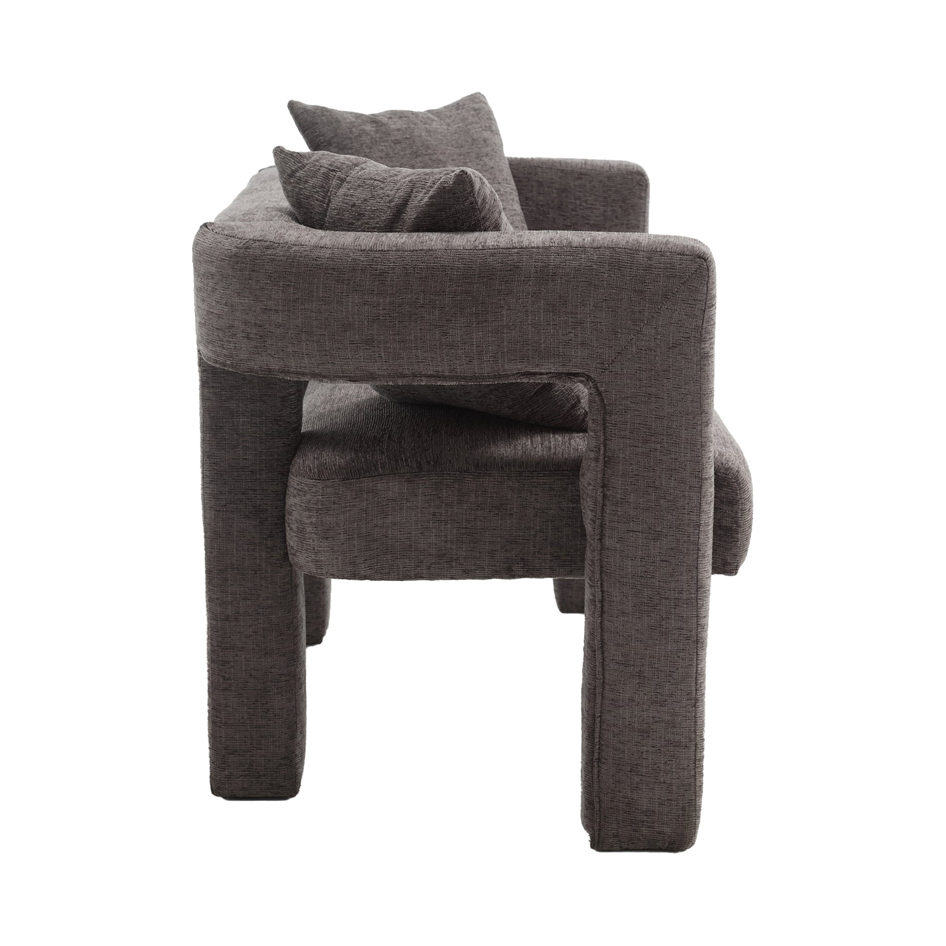 Dark grey fabric armchair with plush cushions modern design