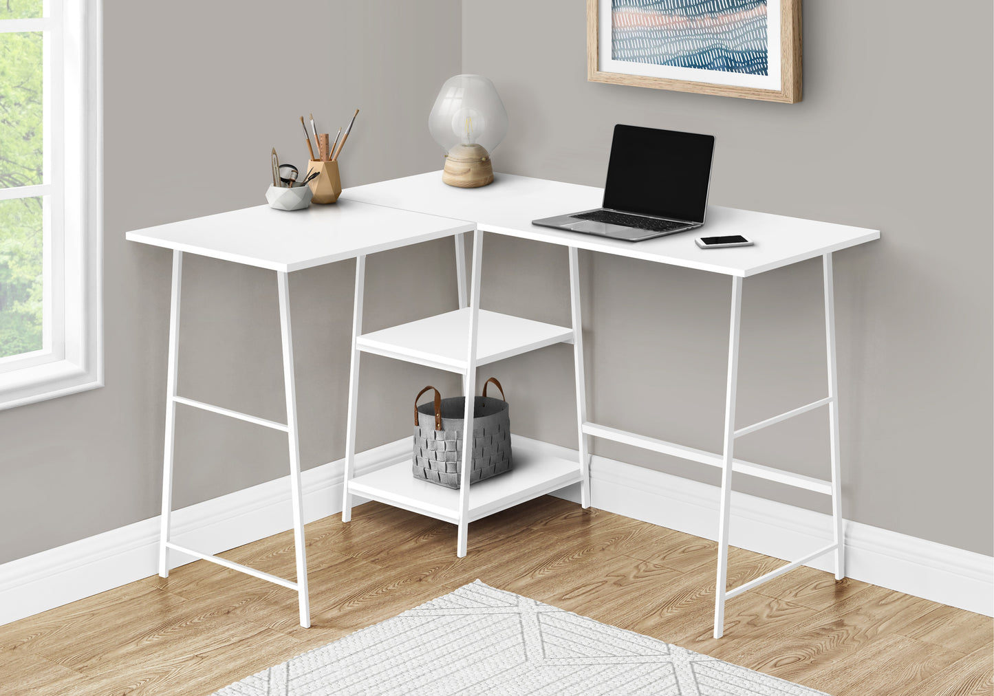White metal corner desk with builtin shelves laptop and desk accessories