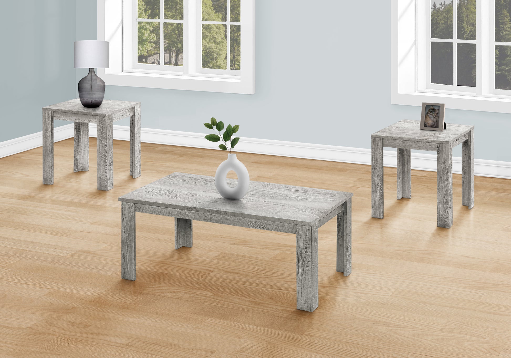 Gray washed wood coffee table with a modern rectangular design