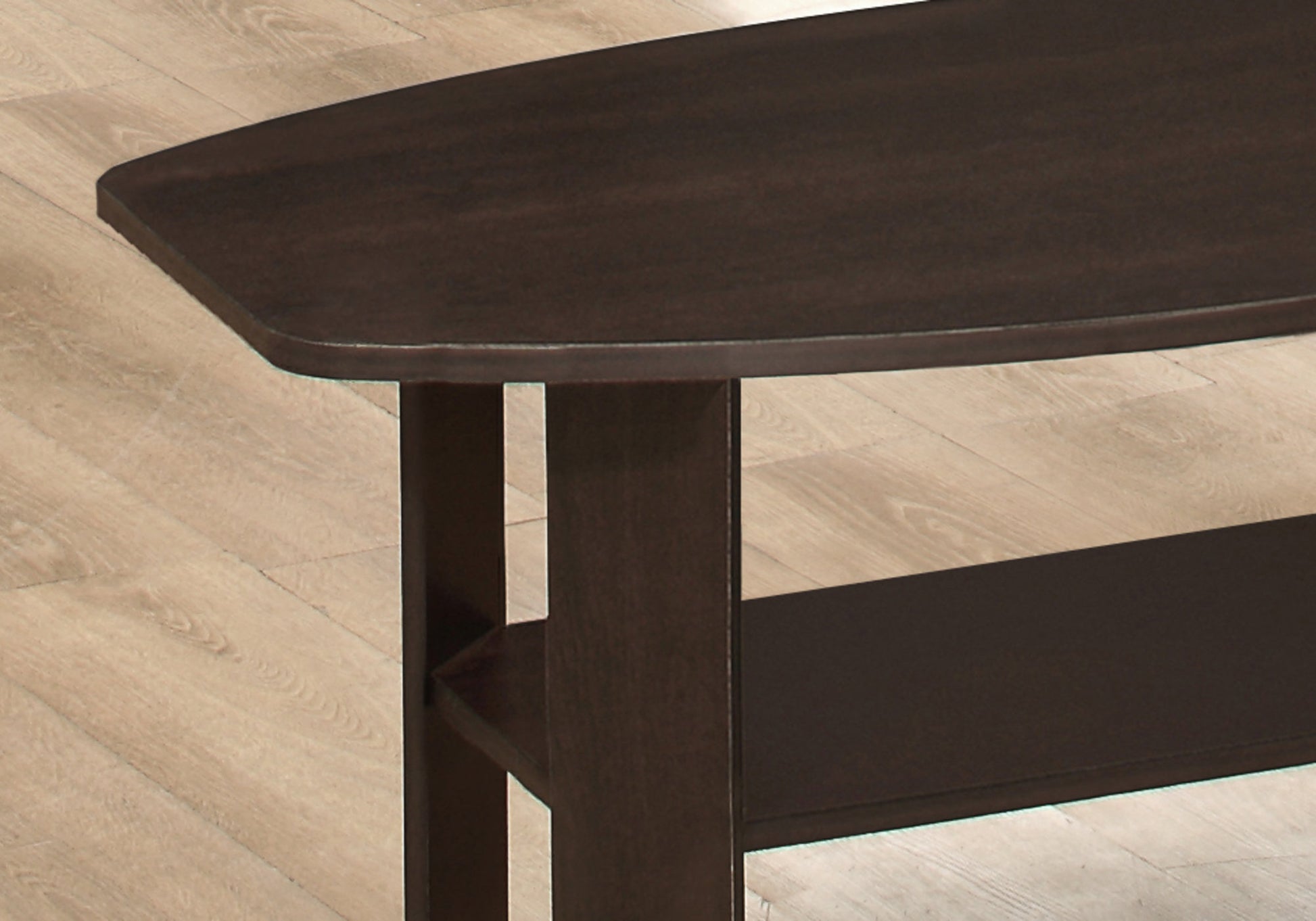 Dark brown modern coffee table with rounded edges and a lower shelf