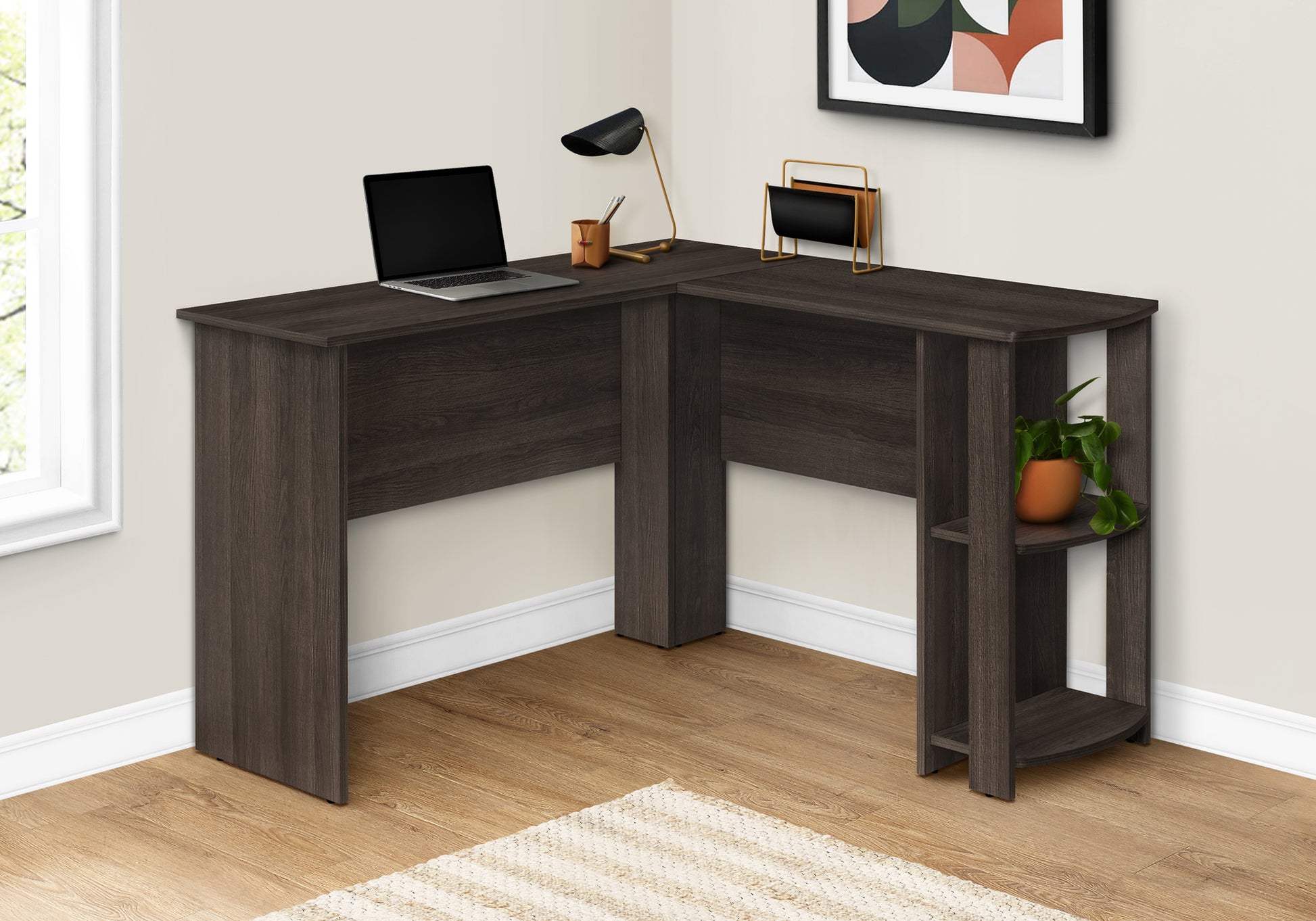 Dark wood Lshaped computer desk with builtin shelving perfect for home office setups