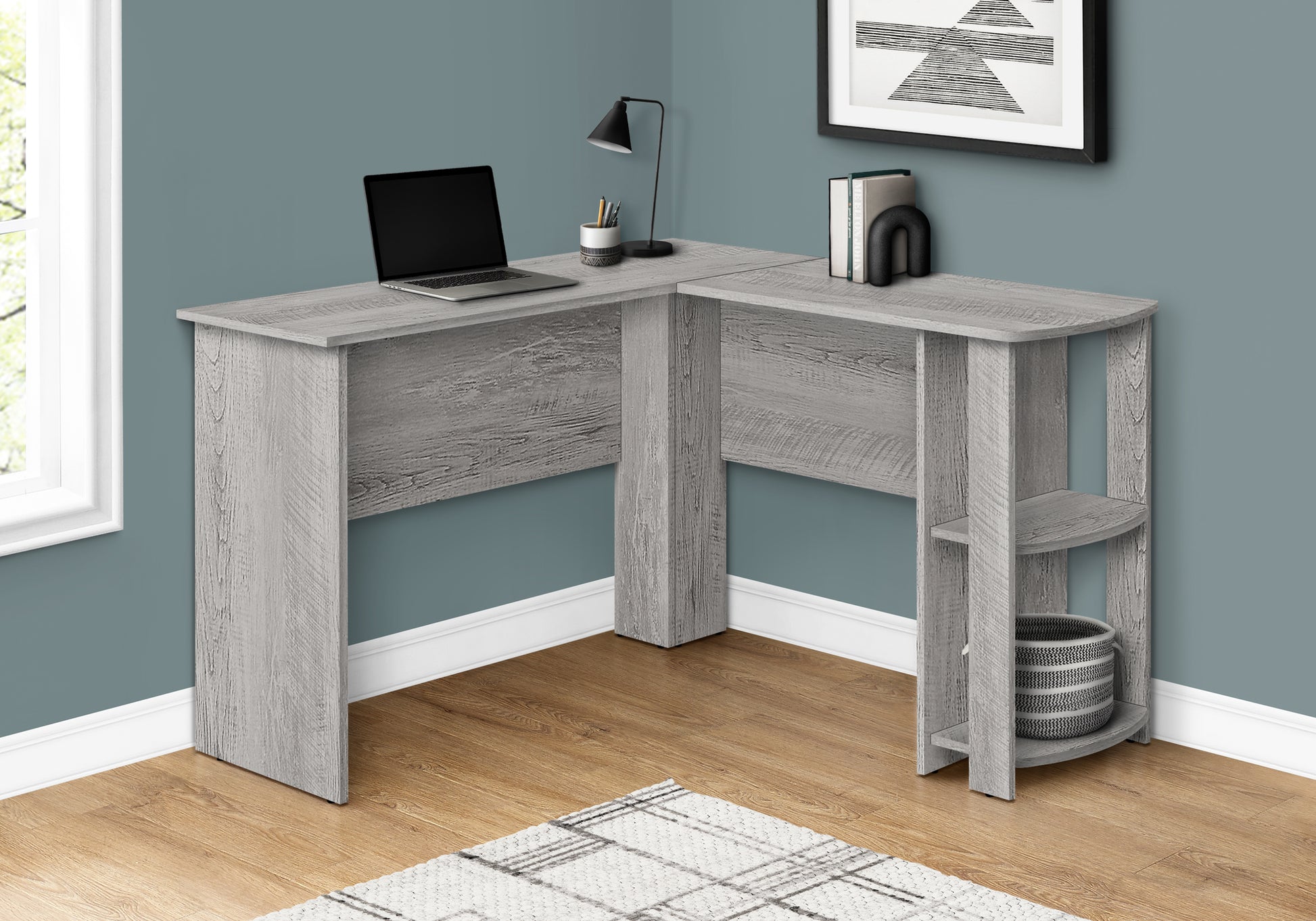 Gray wash finish corner desk with Lshaped surface and open shelving for home office