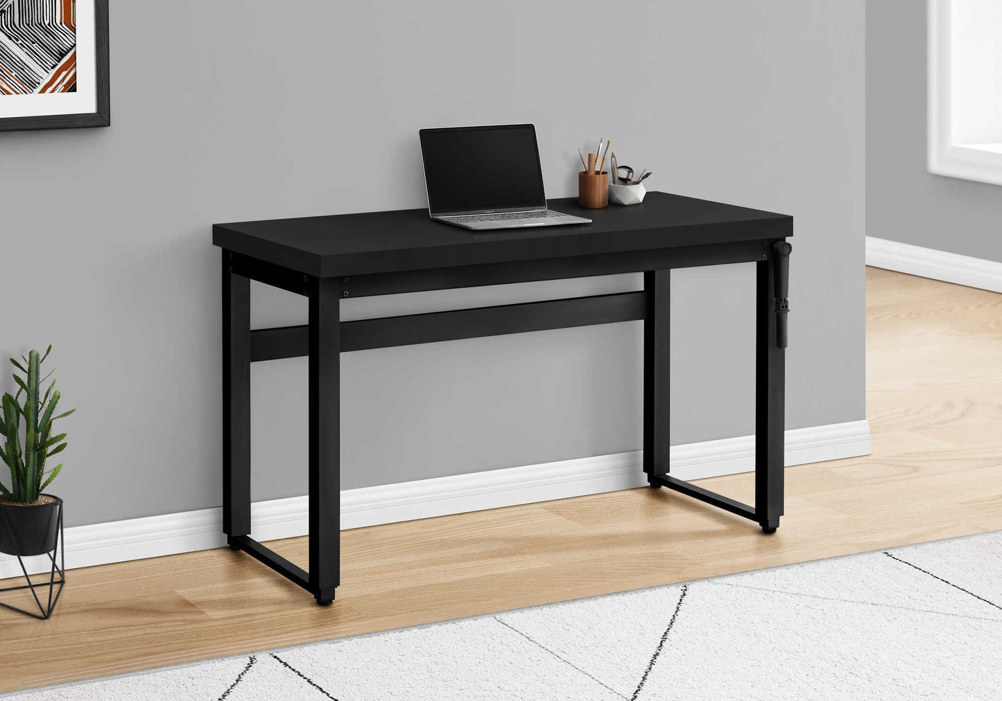 Sleek black writing desk with modern metal legs ideal for home office