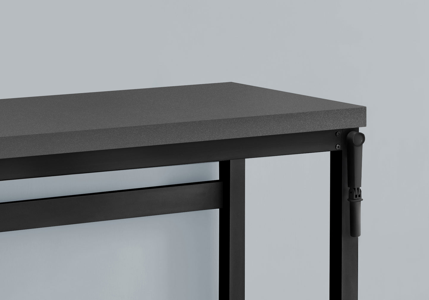 Textured dark grey table top with black metal frame and adjustable leg