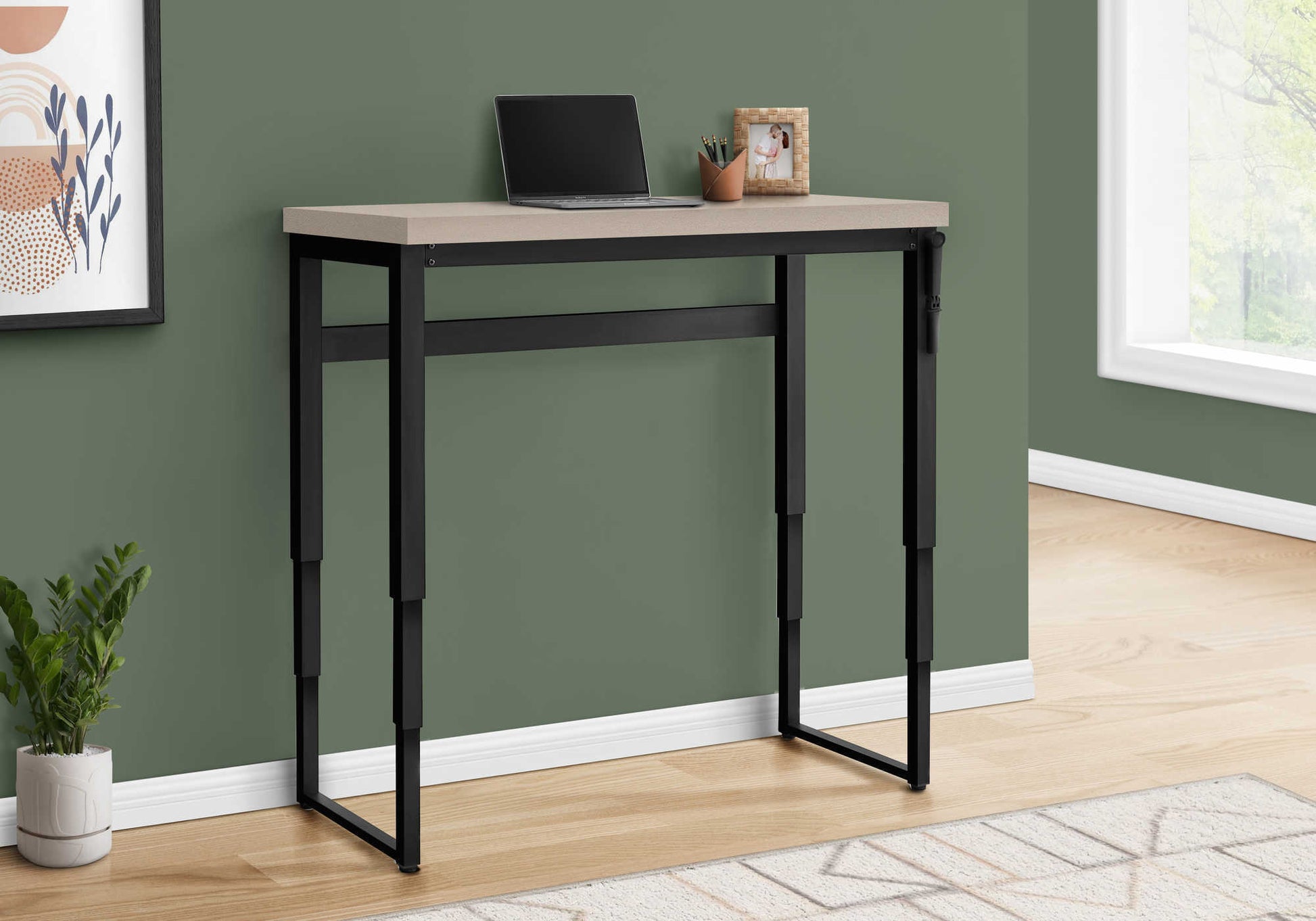 Light brown compact computer desk with black metal frame legs