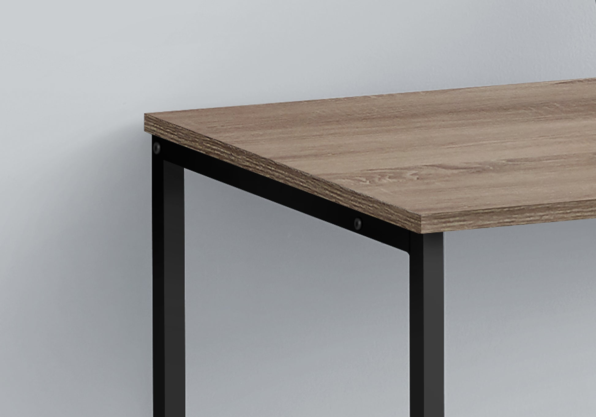 Minimalist wooden desk with black metal legs showcasing clean lines and modern design