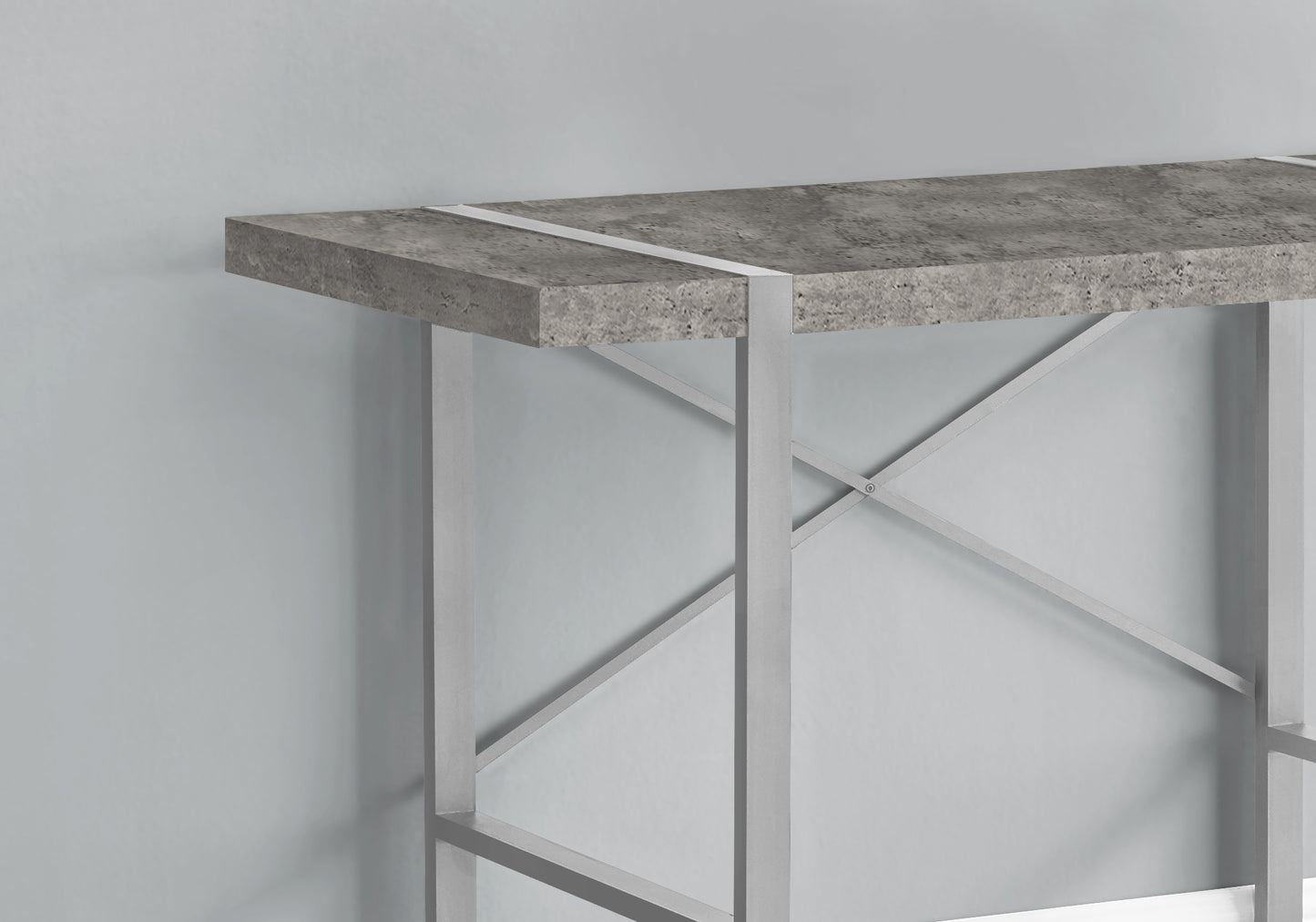 Industrial style console table with a faux concrete top and silver metal frame