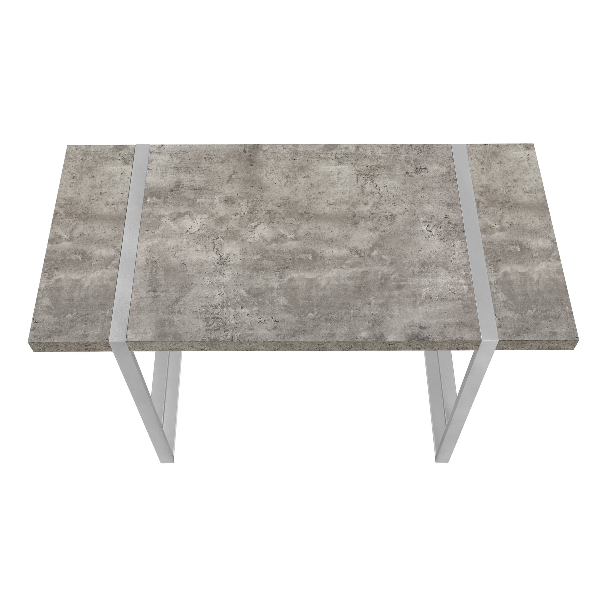 Modern concrete top dining table with sleek silver legs perfect for contemporary kitchens