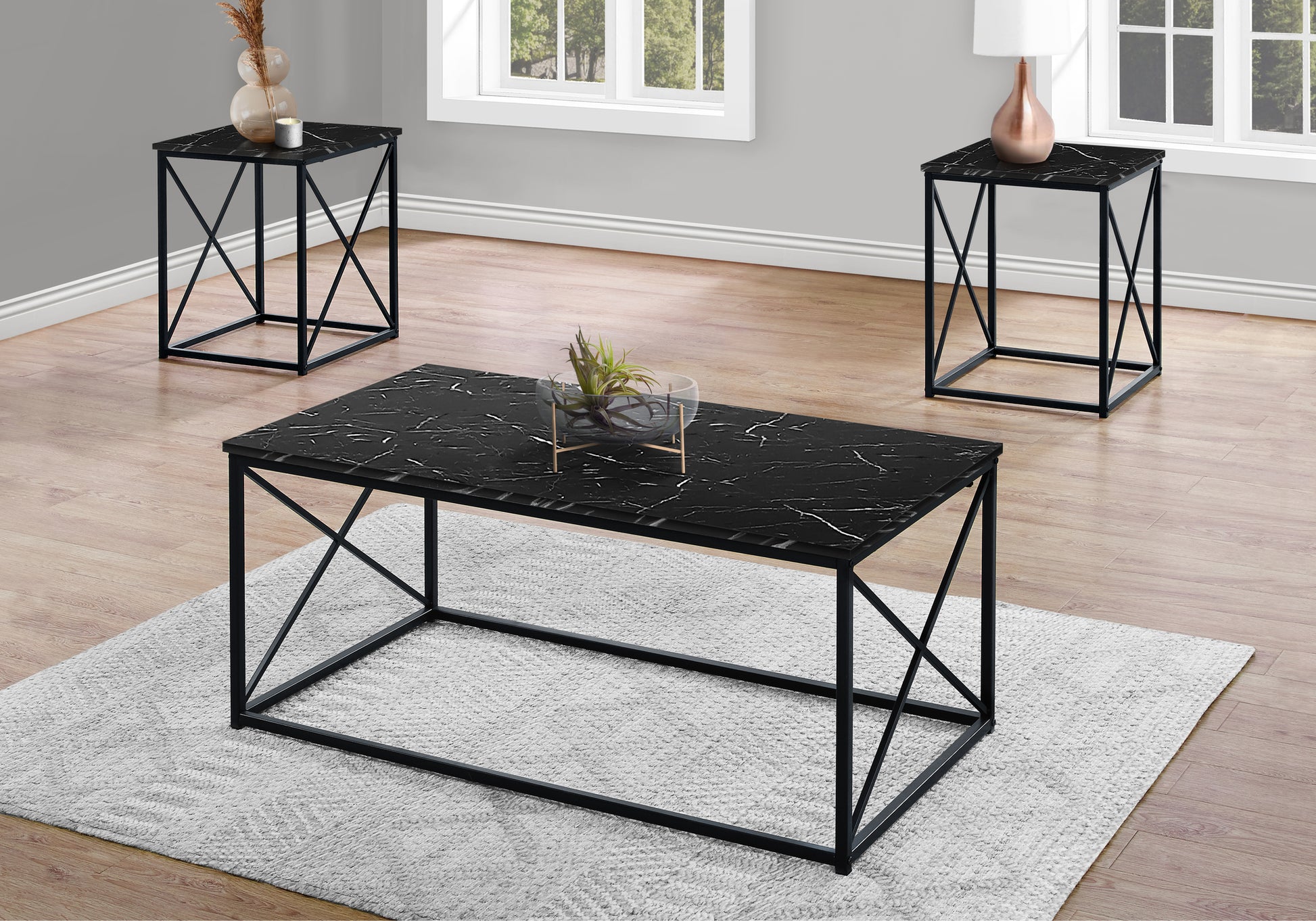 Black marble coffee table with sleek metal frame perfect for modern living rooms
