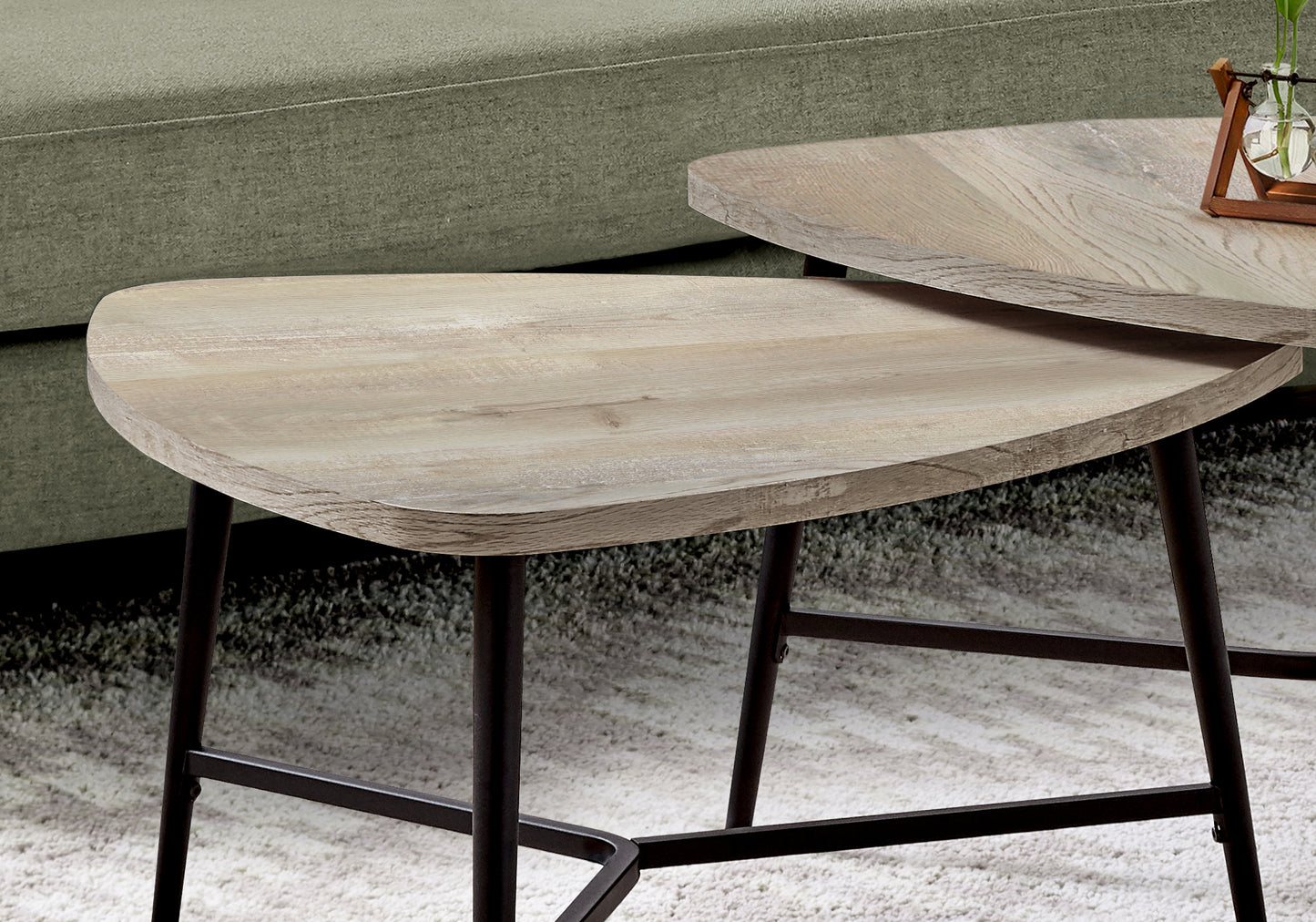 Light wood nesting coffee tables with modern metal legs
