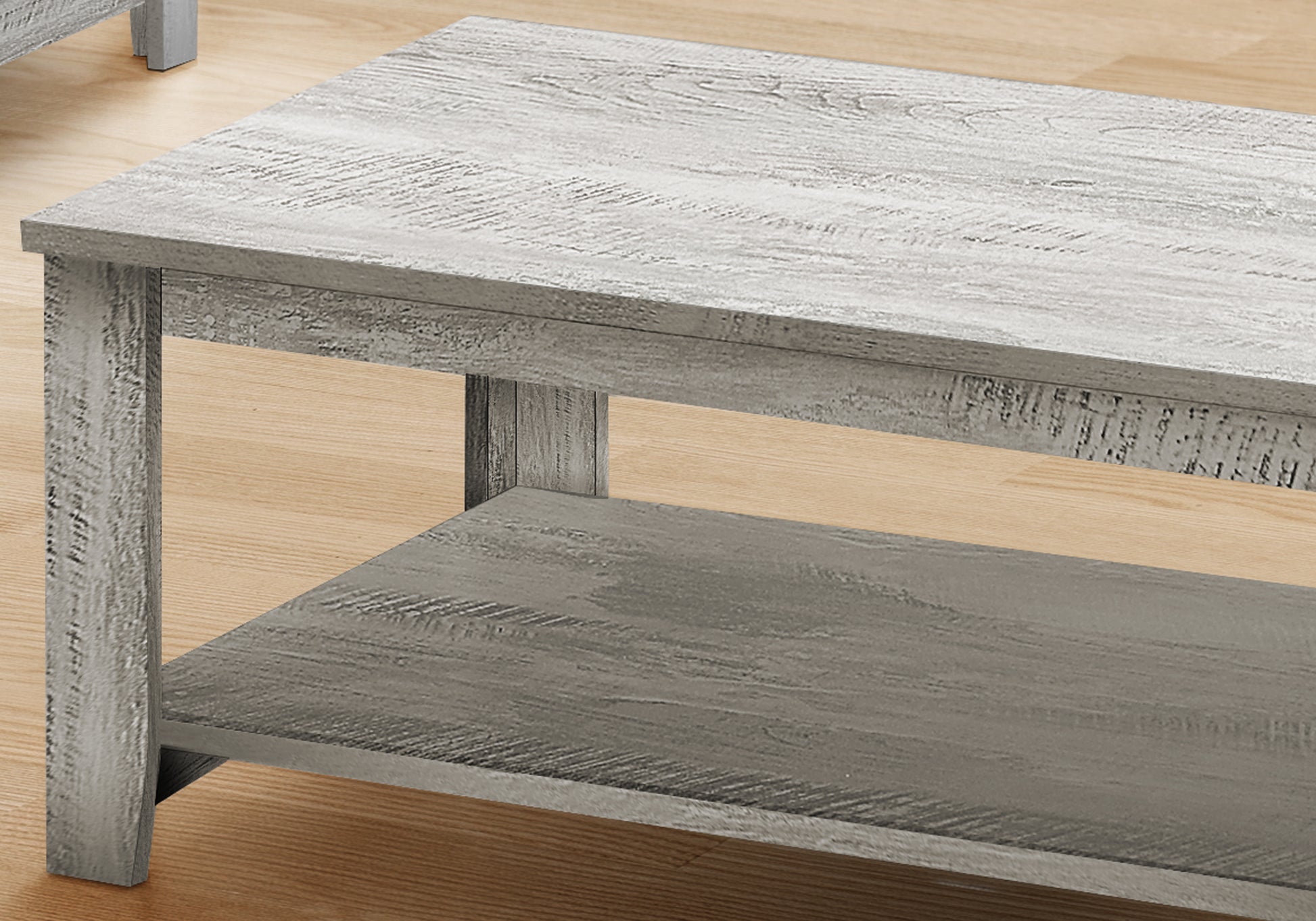 Rustic white wash coffee table with a lower shelf and distressed wood grain texture