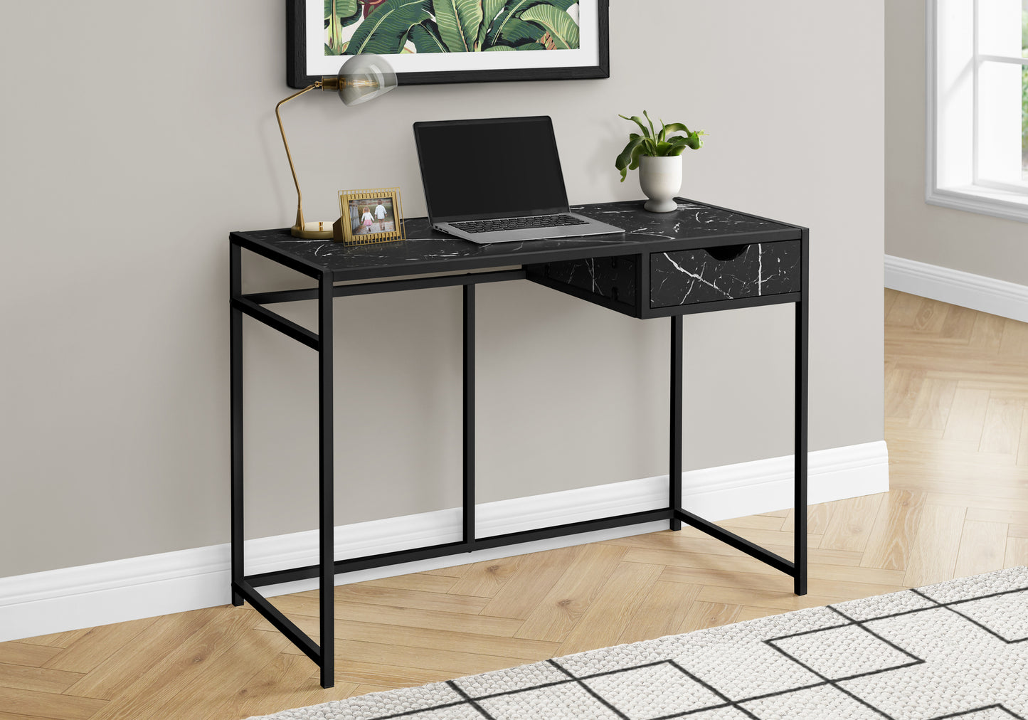 Modern black marble top writing desk with thin metal legs and one drawer