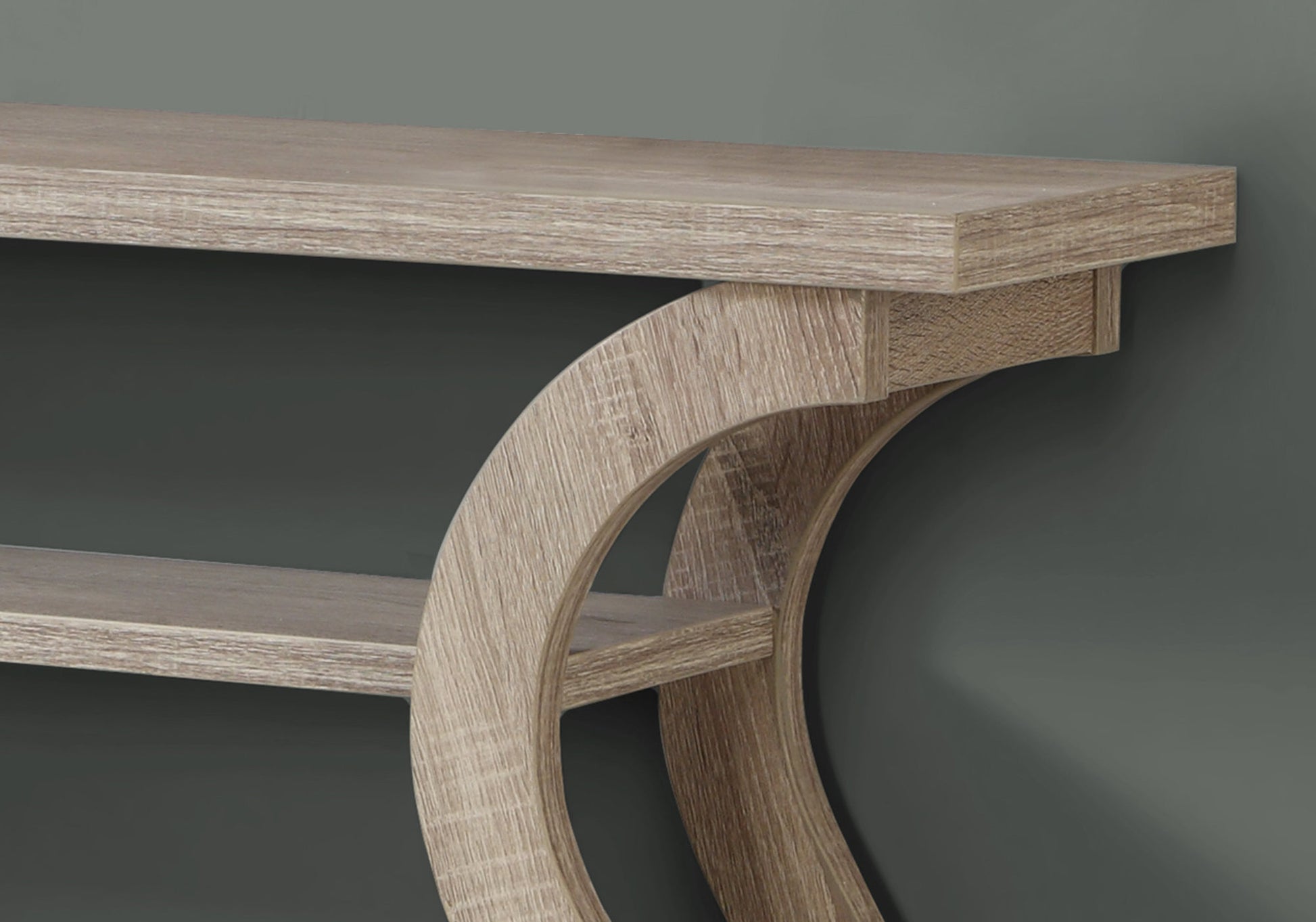 Weathered oak console table with distinctive curved supports