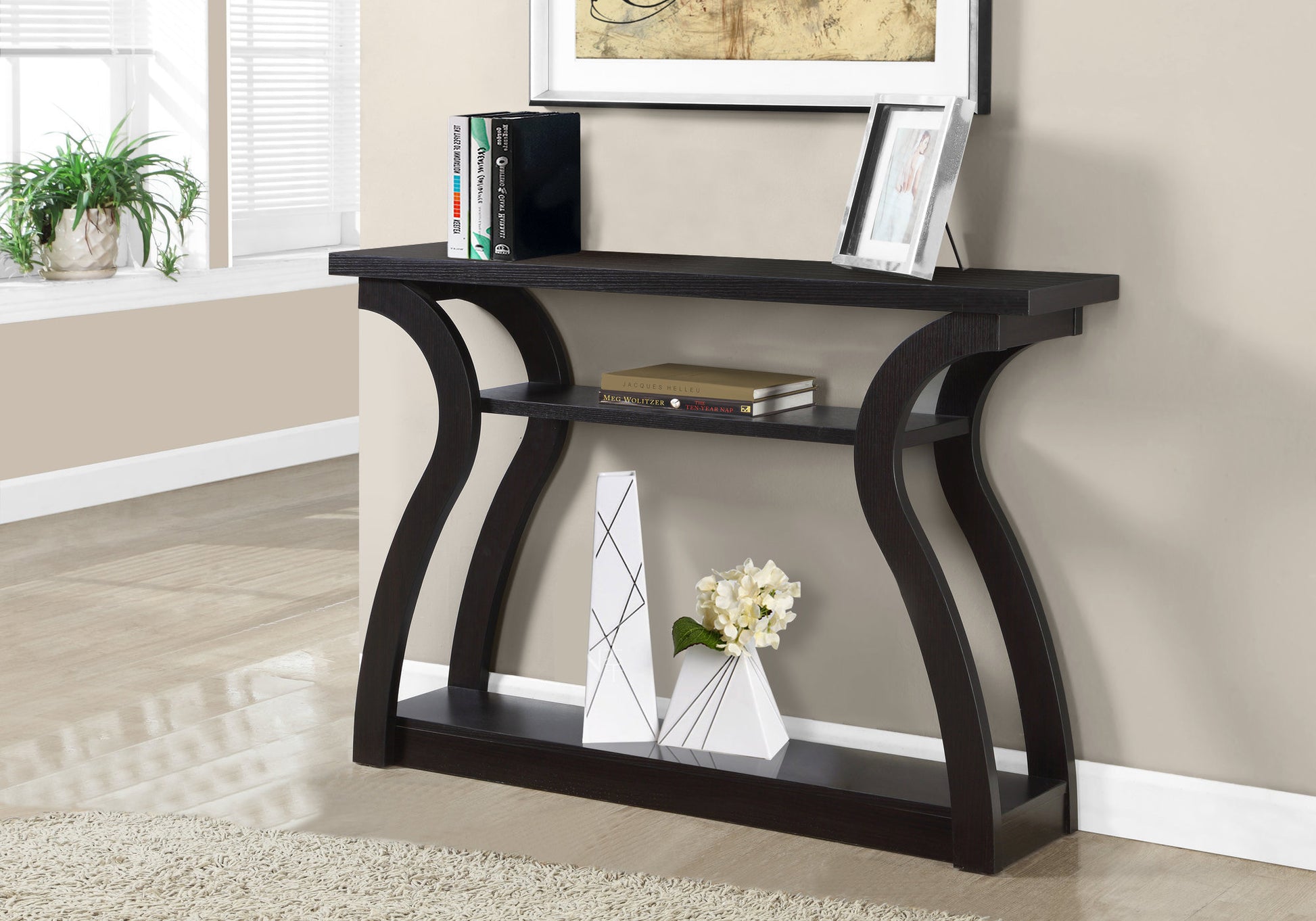 Dark espresso console table with sculpted sides perfect for entryways