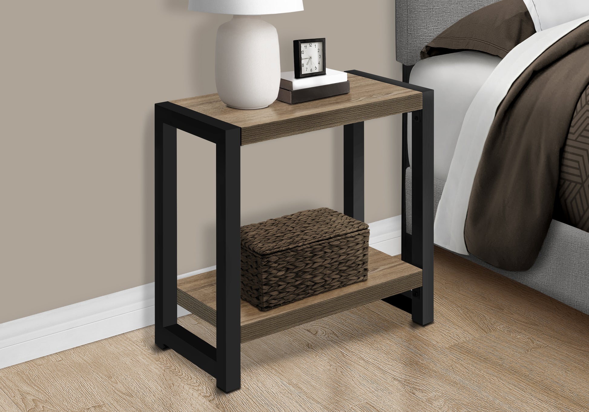 Rustic oak veneer end table with black metal frame featuring two shelves and a woven storage basket