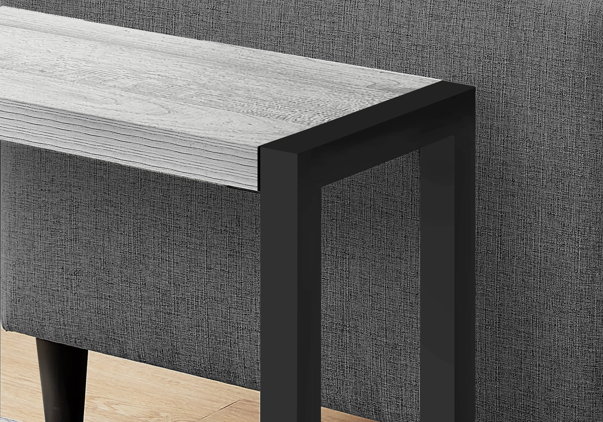 Modern console table with light wood top and black metal frame