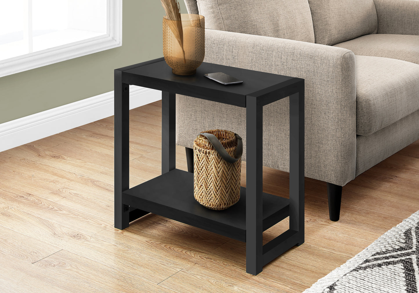 Sleek black end table with two tiers perfect for living room placement