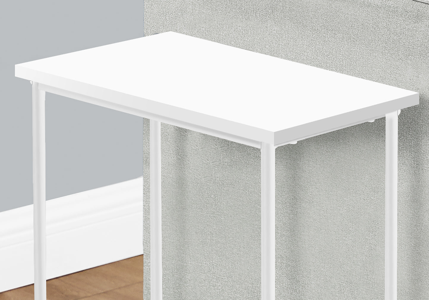 White narrow side table with metal legs ideal for small spaces