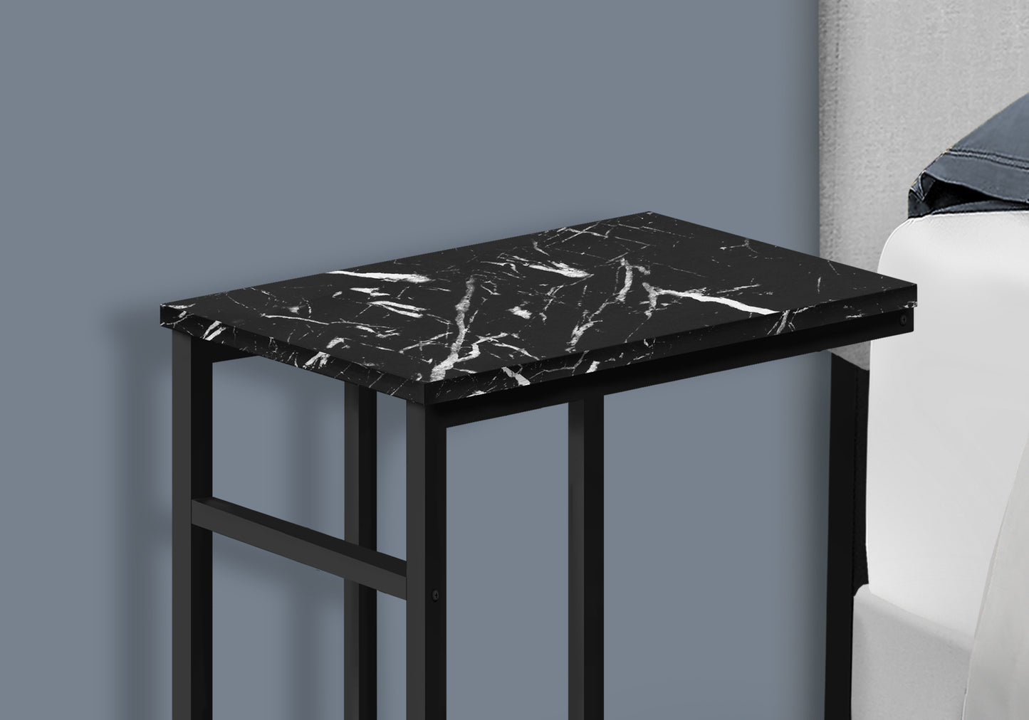Black marble side table with sleek black metal frame modern design