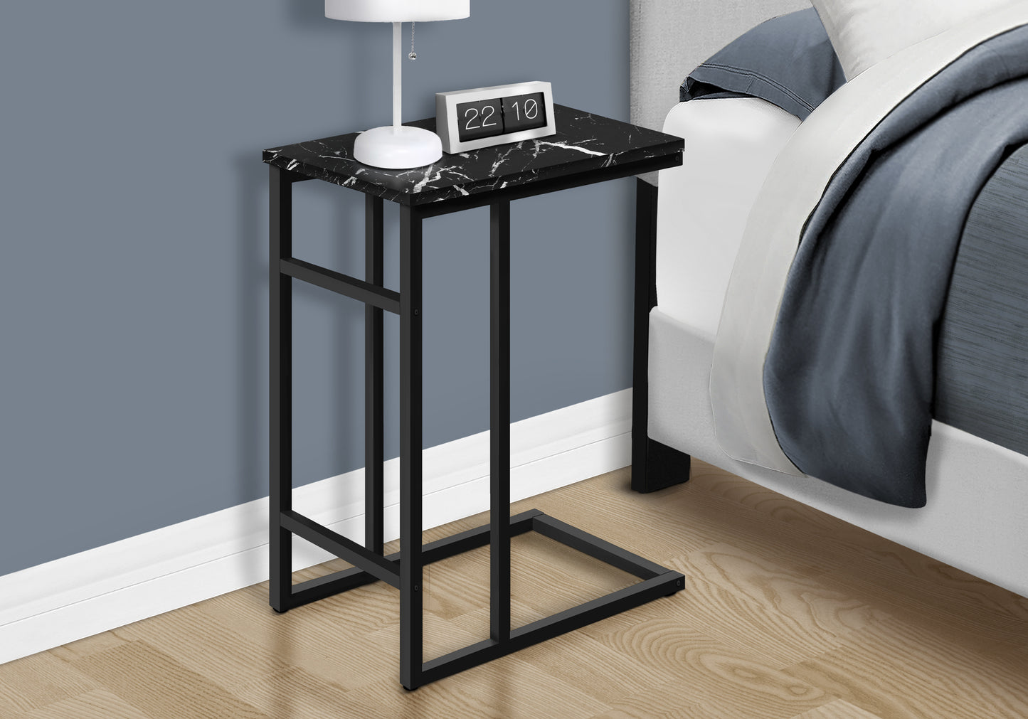 Black marble top ctable with black metal frame ideal for small spaces