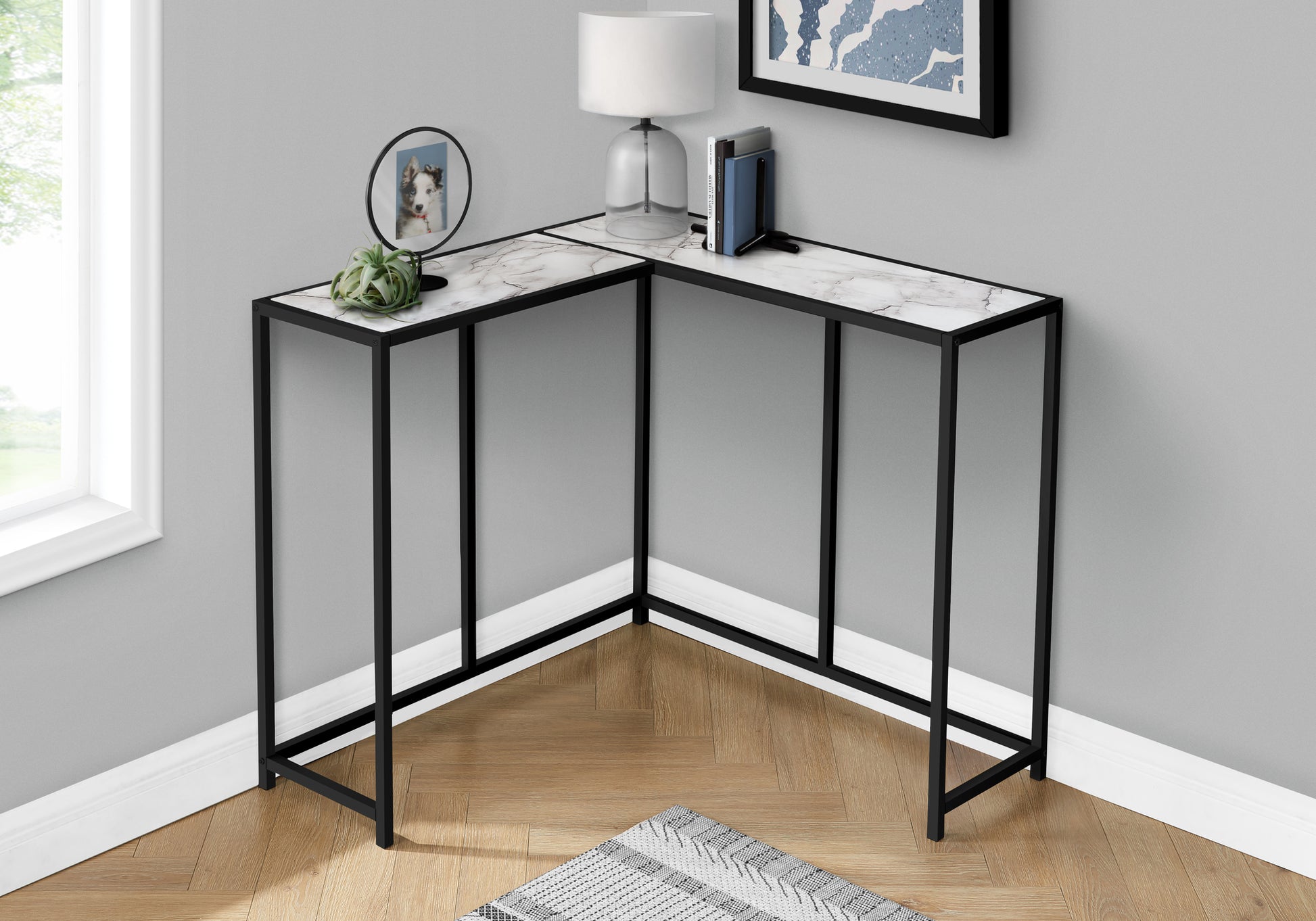 Modern Lshaped console table with white marblelook top and black metal frame
