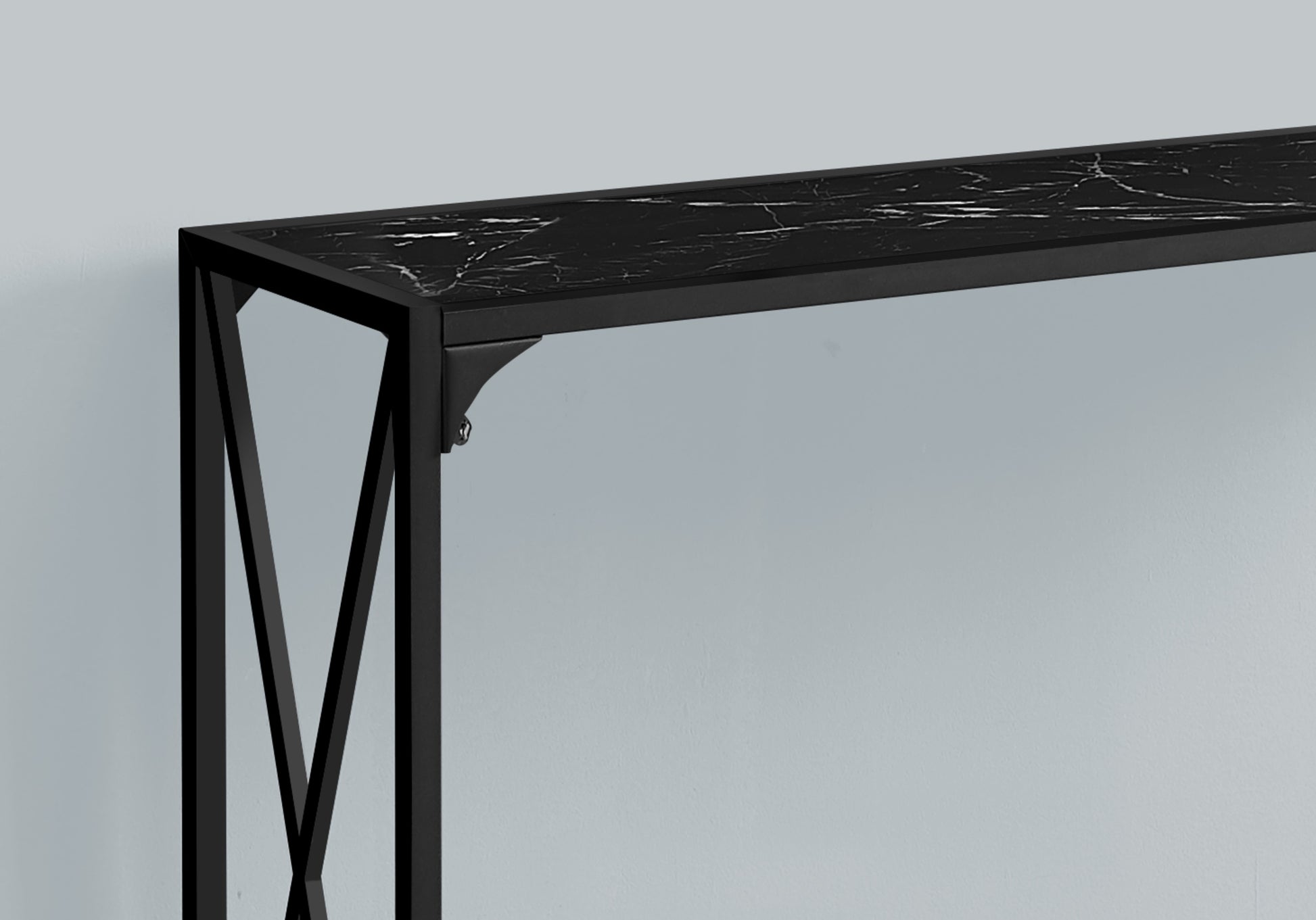Black marble top console table with minimalist metal frame