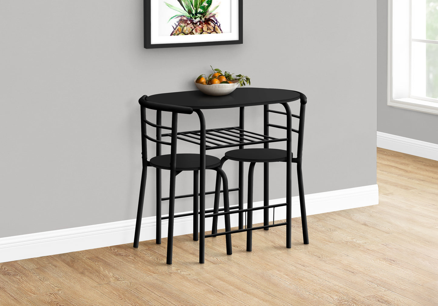 Black metal bistro set with two stools and oval tabletop perfect for small spaces