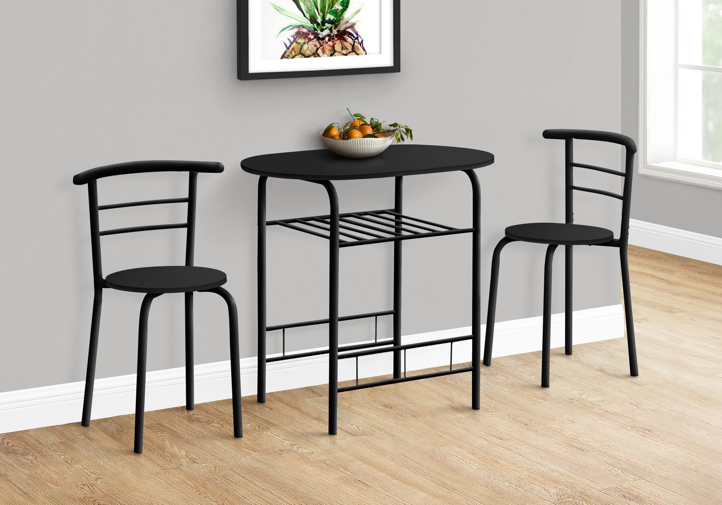 Black metal bistro set with oval table and two chairs