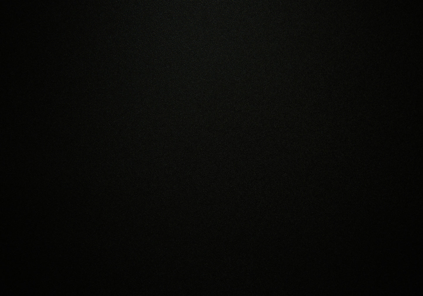 Abstract textured black background perfect for minimalist design or premium product backdrops