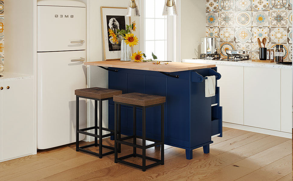 Navy blue kitchen island with wooden countertop and two bar stools
