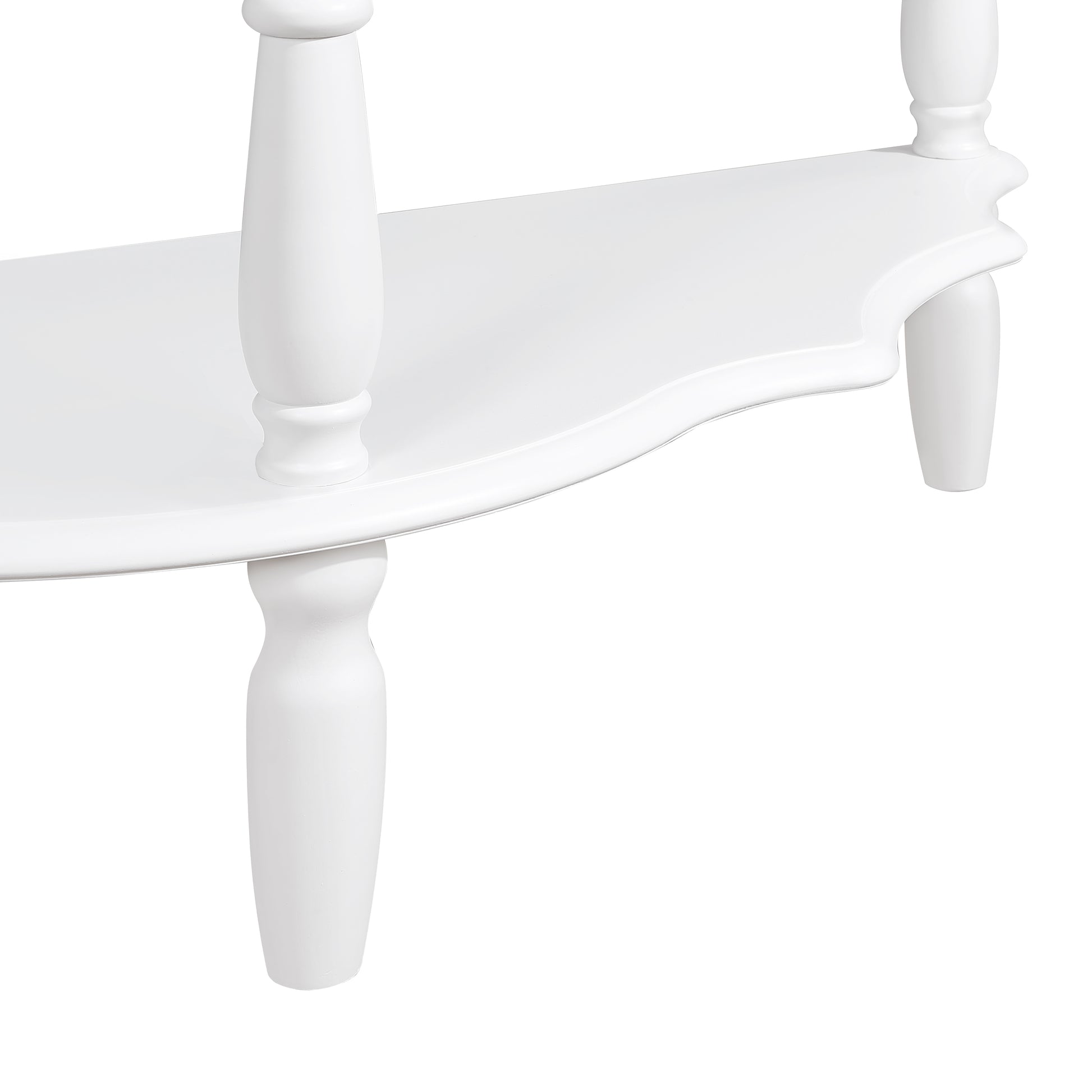 Close up of white wooden accent table leg with curved detailing modern design