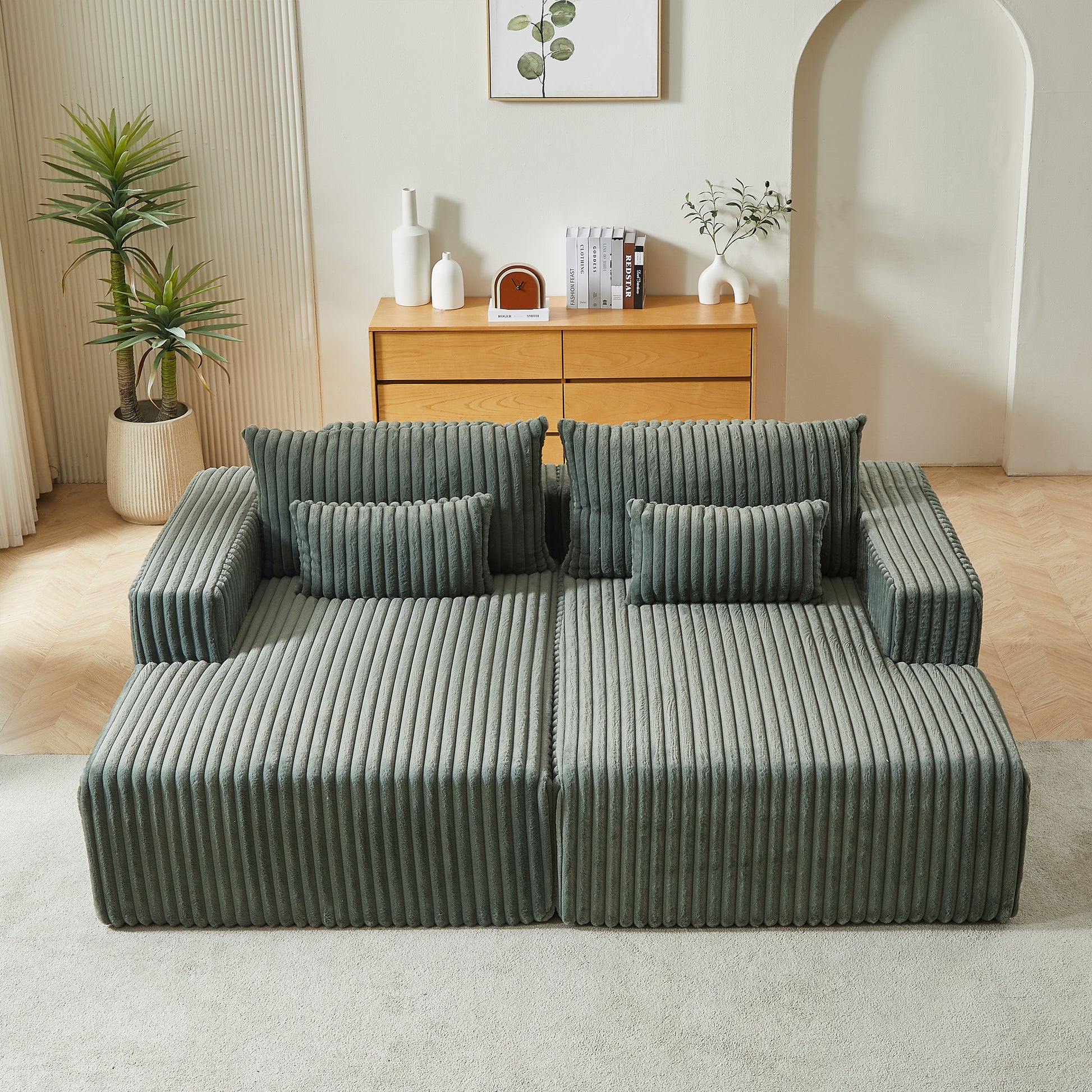 Sage green corduroy sectional sofa with plush cushions perfect for modern living rooms