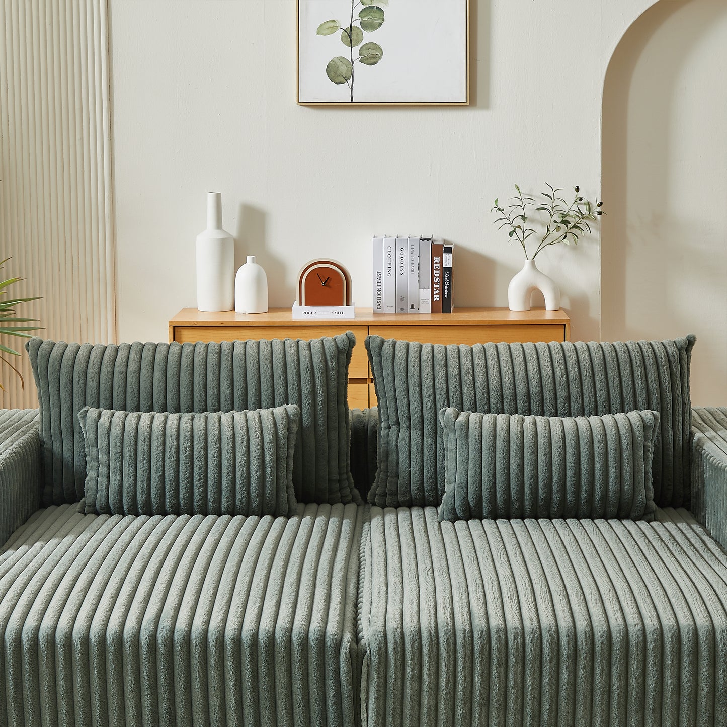 Plush corduroy sofa in sage green featuring deep channel tufting for a modern look