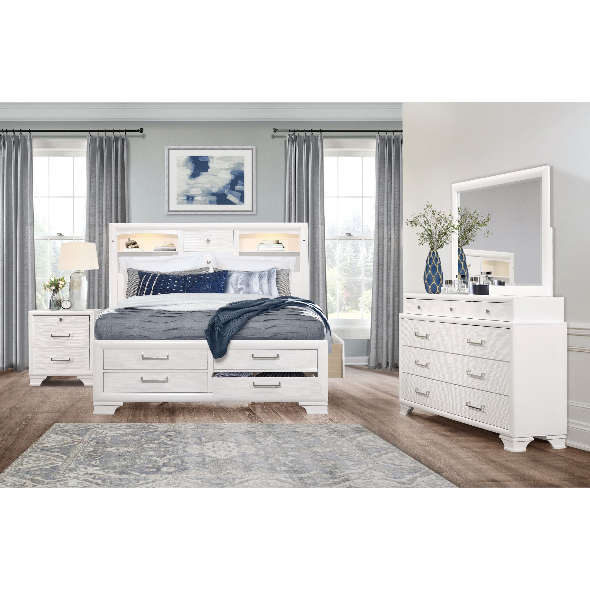White wooden king bed with builtin storage drawers and shelving unit