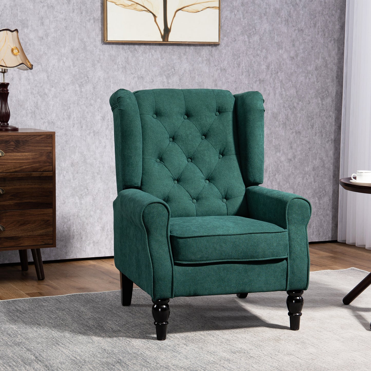 Emerald green fabric armchair with tufted back ideal for living rooms