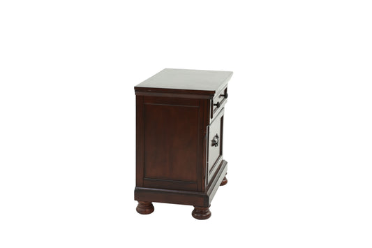 Dark brown wooden nightstand with one drawer and one door with ornate hardware