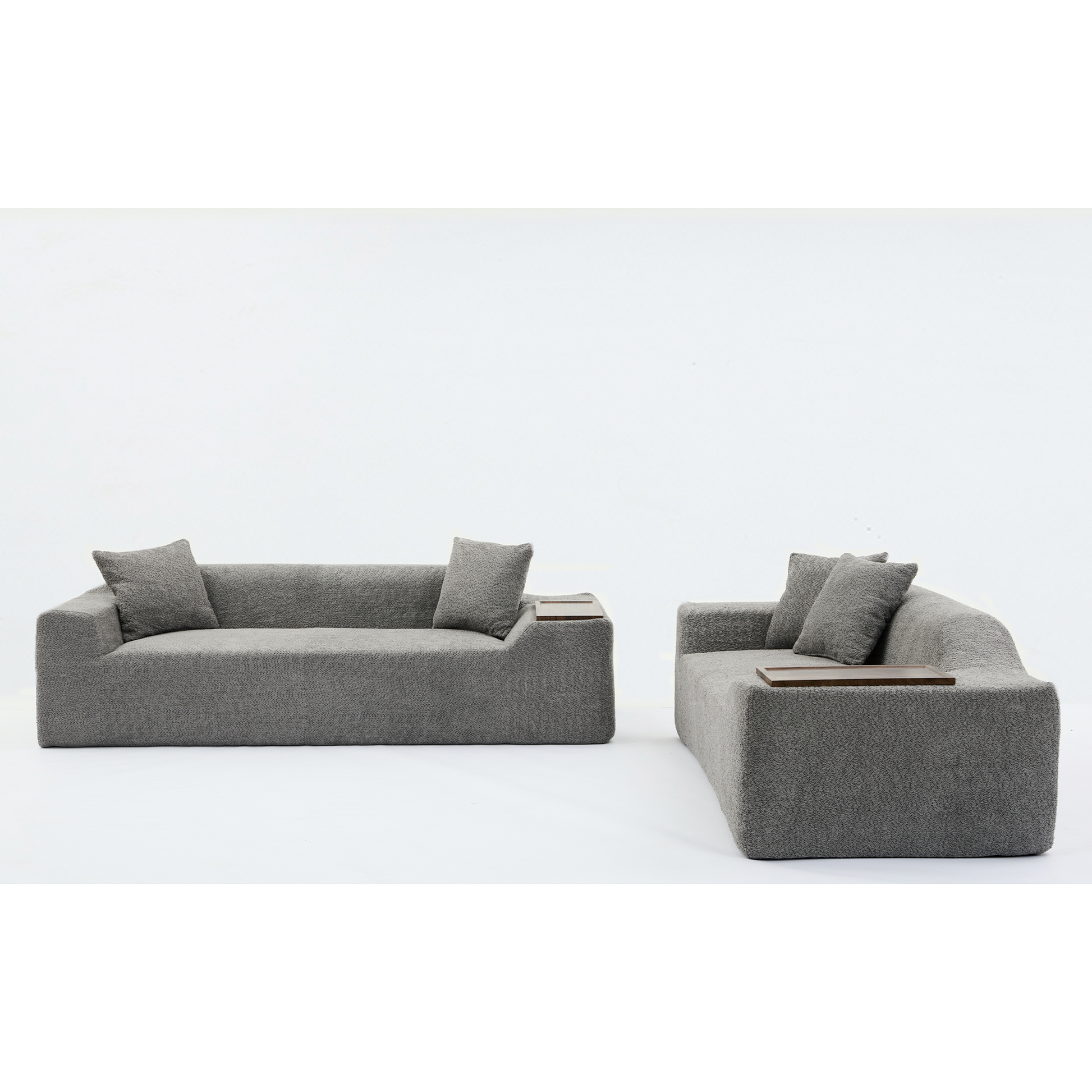 Gray modular sectional sofa with integrated wooden side tables perfect for modern living rooms