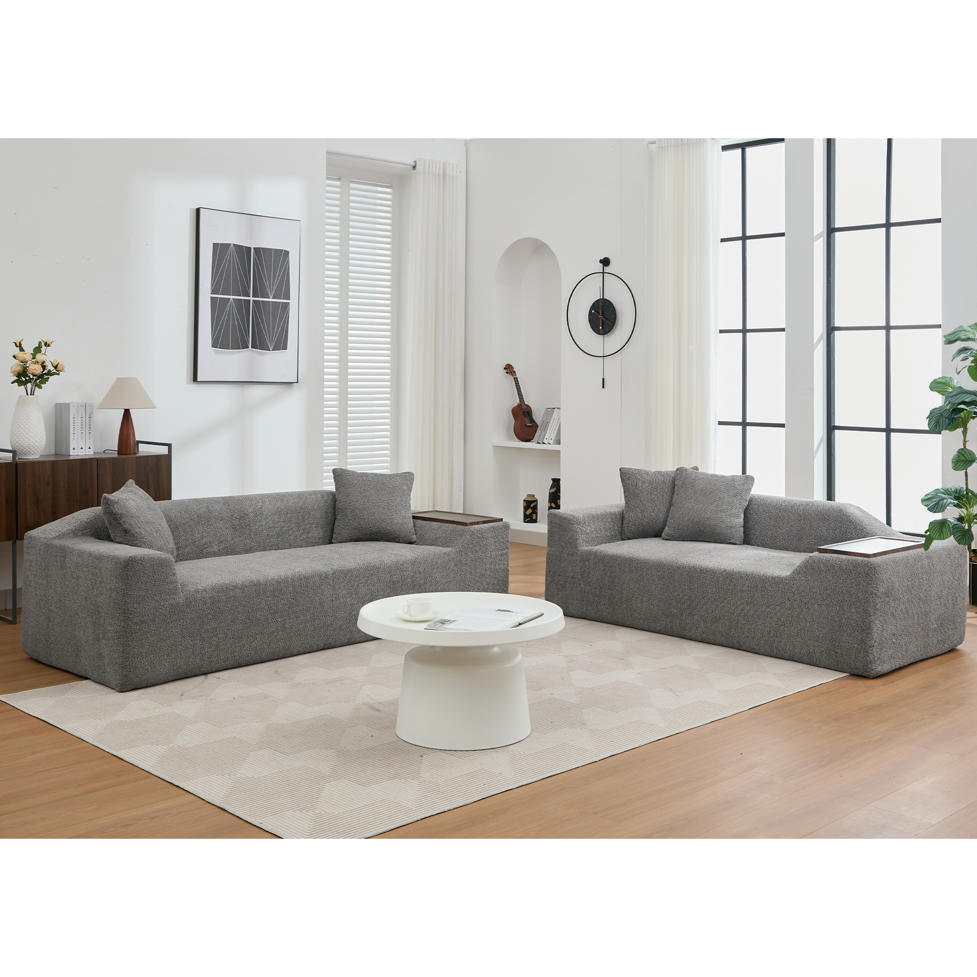 Gray textured fabric sectional sofa with wooden armrest and scattered pillows