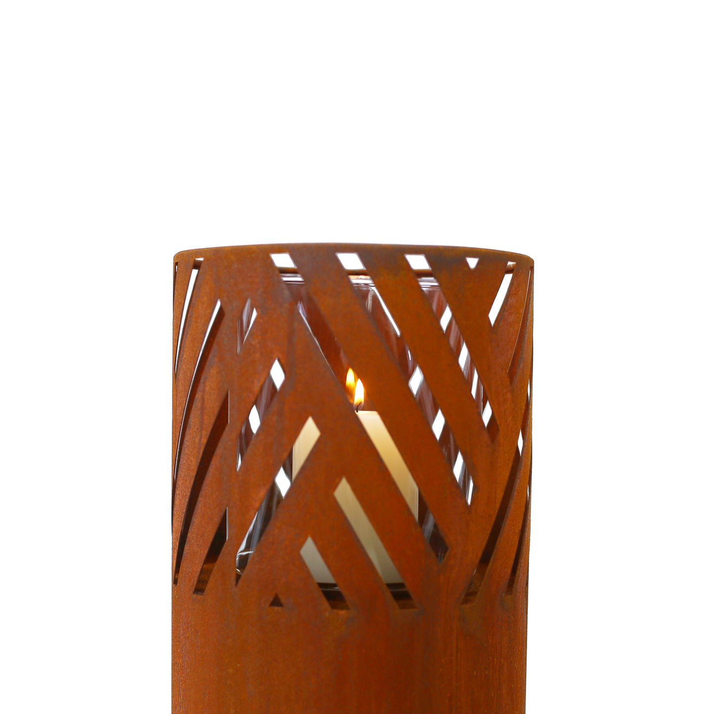 Rusty metal lantern with abstract cutouts holding a lit candle