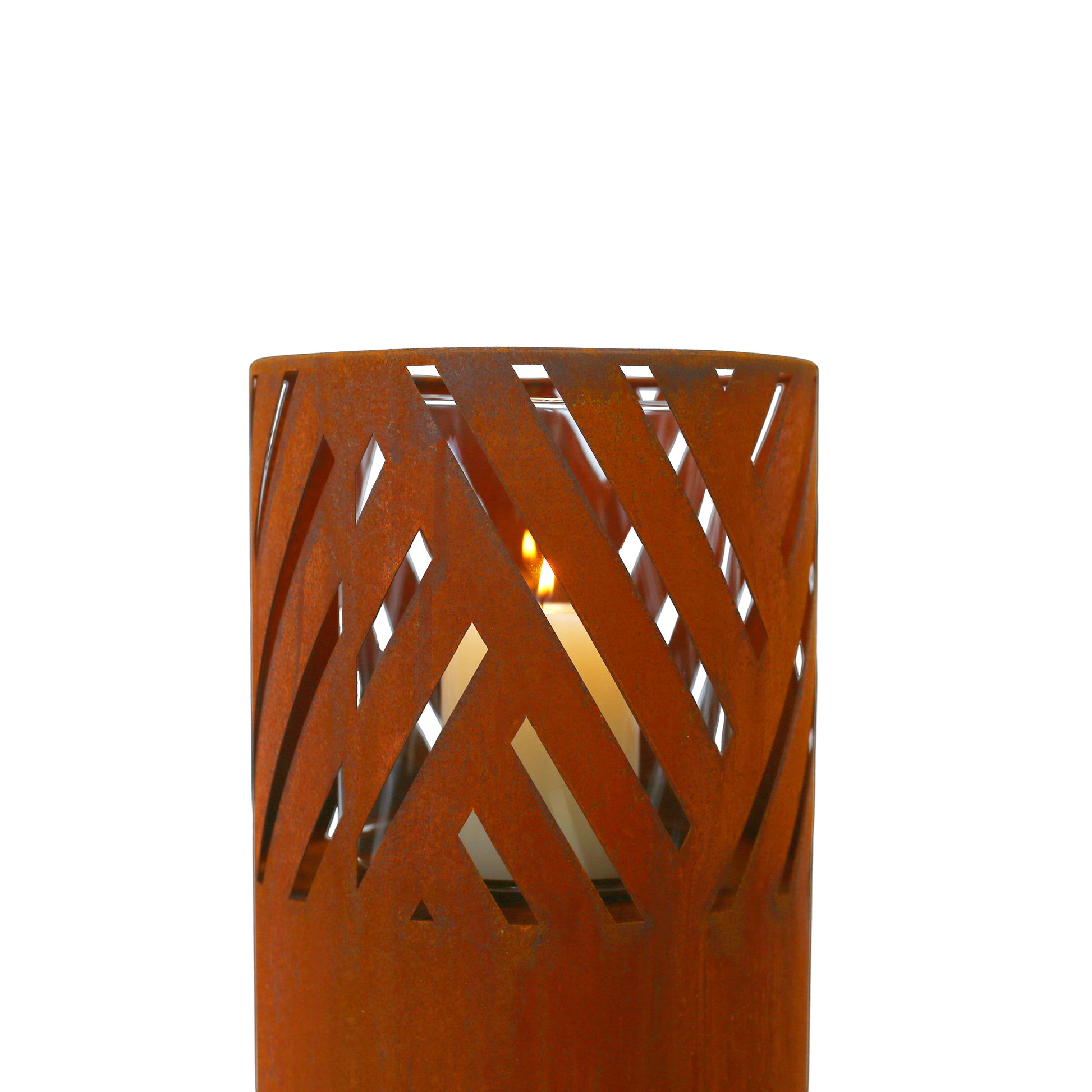 Rustic metal lantern with a cutout chevron pattern holding a lit candle