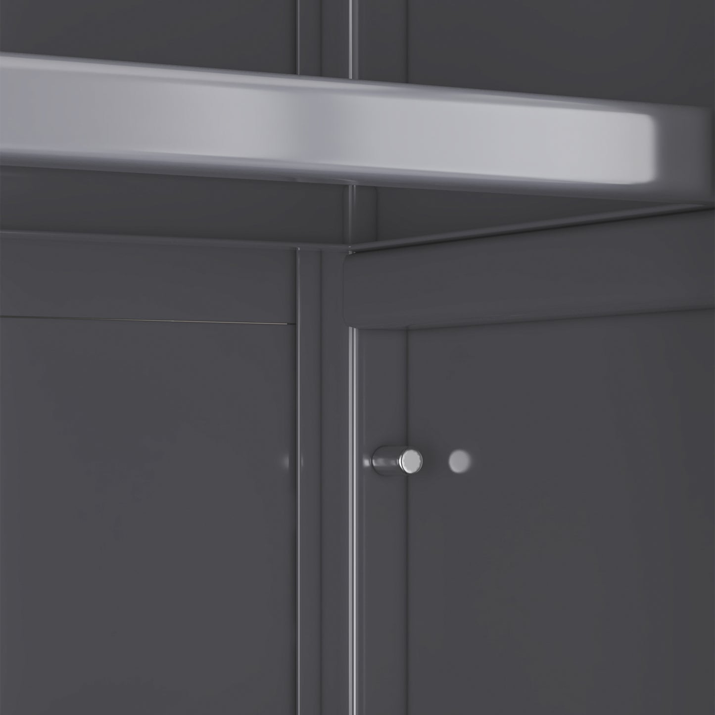 Dark gray modern cabinet interior with polished chrome knob