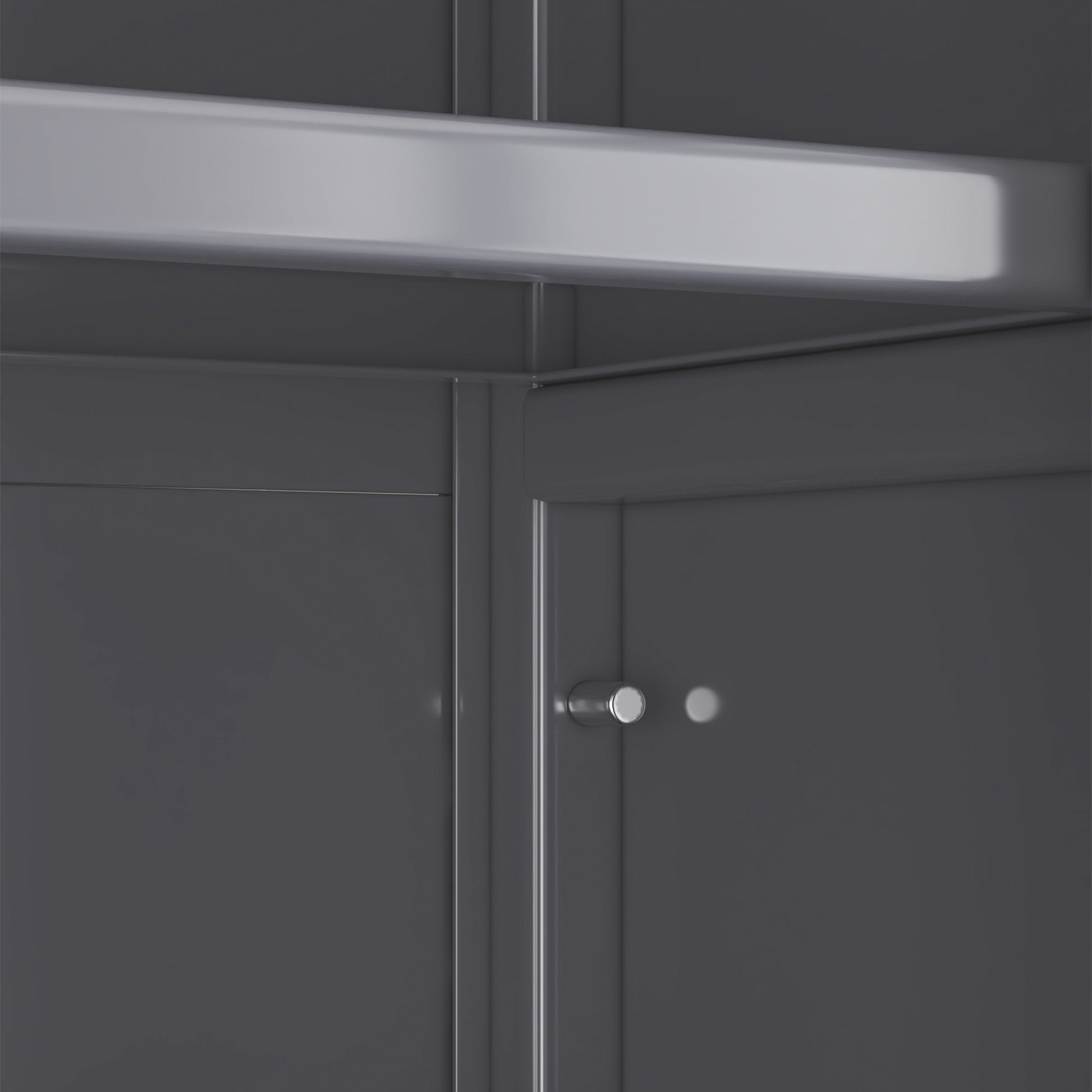 Dark gray modern cabinet interior with polished chrome knob
